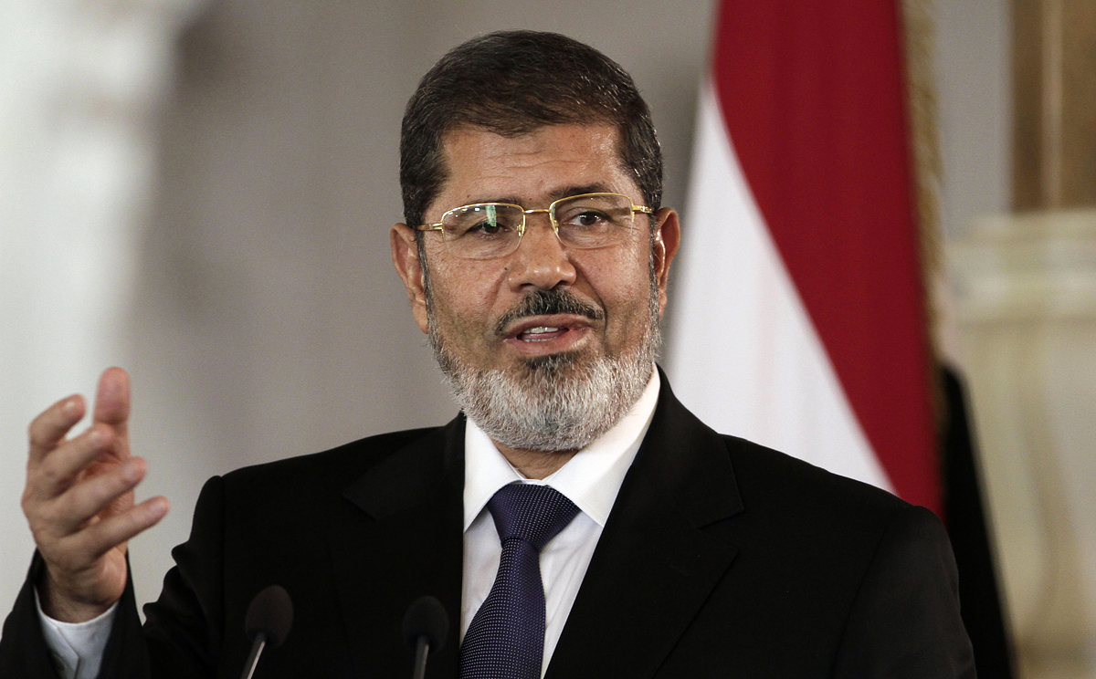 Egyptian President Mohammed Morsi speaks to reporters at the Presidential palace in Cairo. Photo: AP