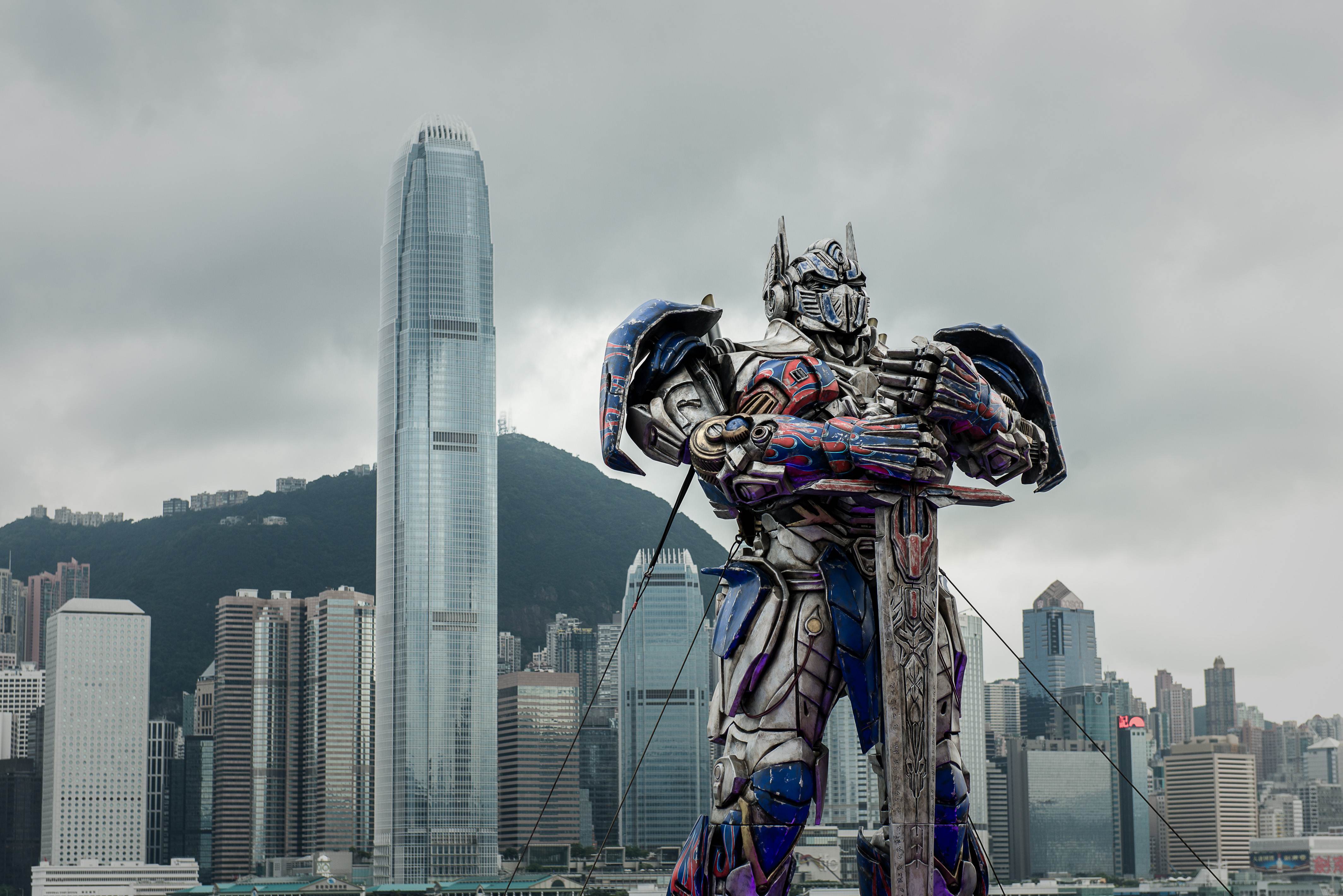 A statue of Optimus Prime overlooks the Hong Kong skyline. Photo: AFP