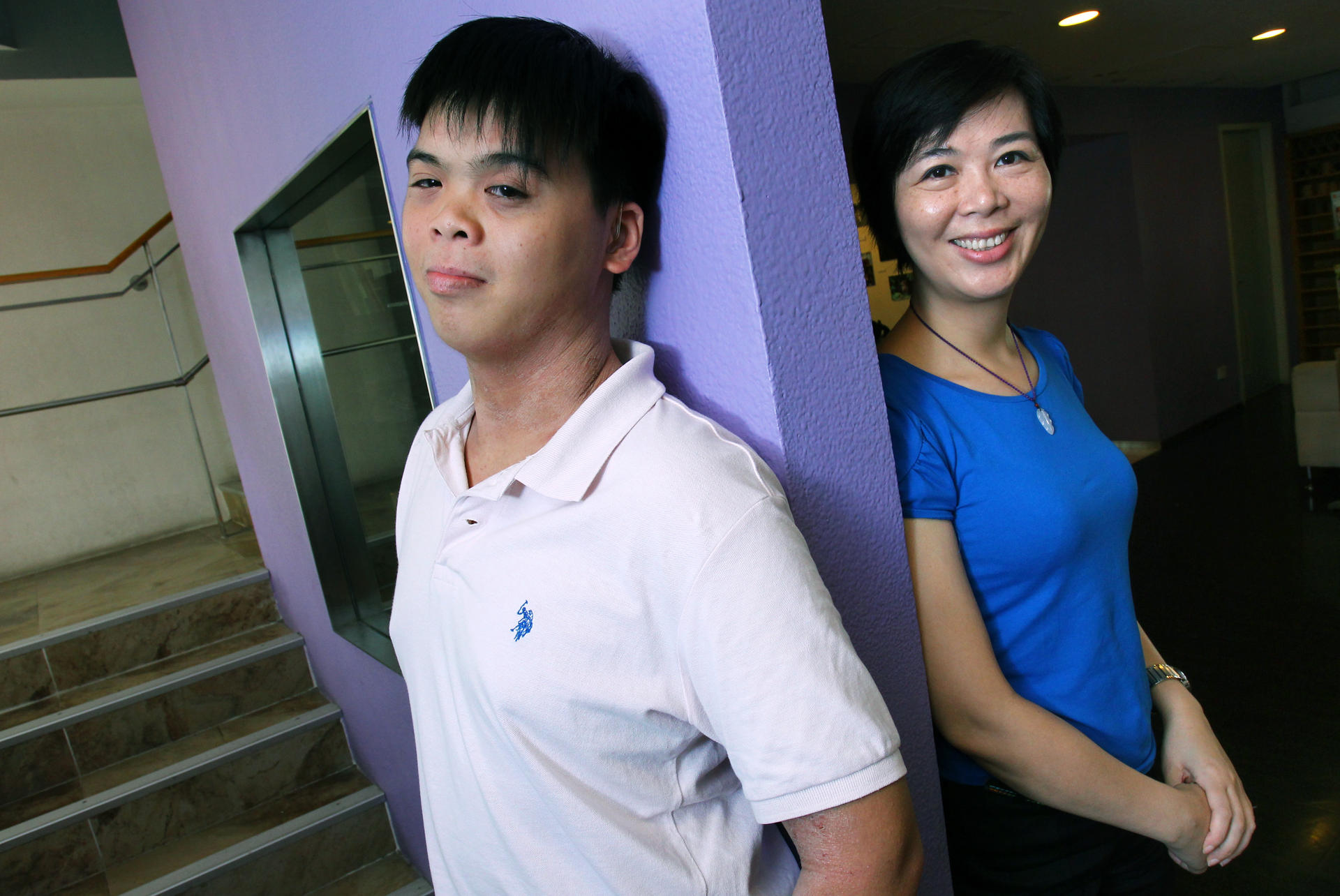 Elvis Yam, with his mother Clara Fong, is one of those awaiting exam results on Monday. Photo: May Tse