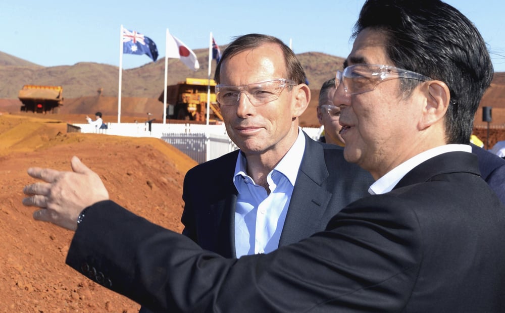 Australian Prime Minister Tony Abbott (left) and Japanese Prime Minister Shinzo Abe tour the Rio Tinto West Angelas iron ore mine in Western Australia on Wednesday. Photo: Reuters