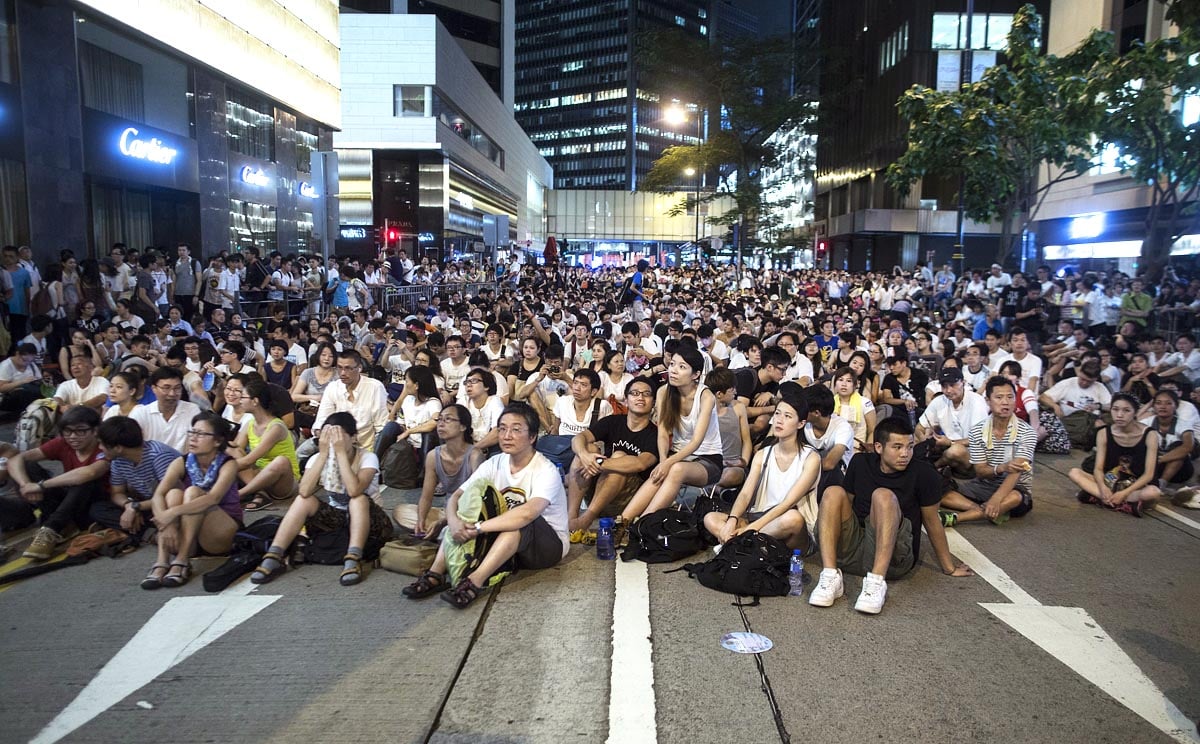 Should the Hong Kong protest end as another Tiananmen Square, it would not only hurt the economy but also destroy China's credibility as a partner that respects legally binding agreeement. Photo: EPA