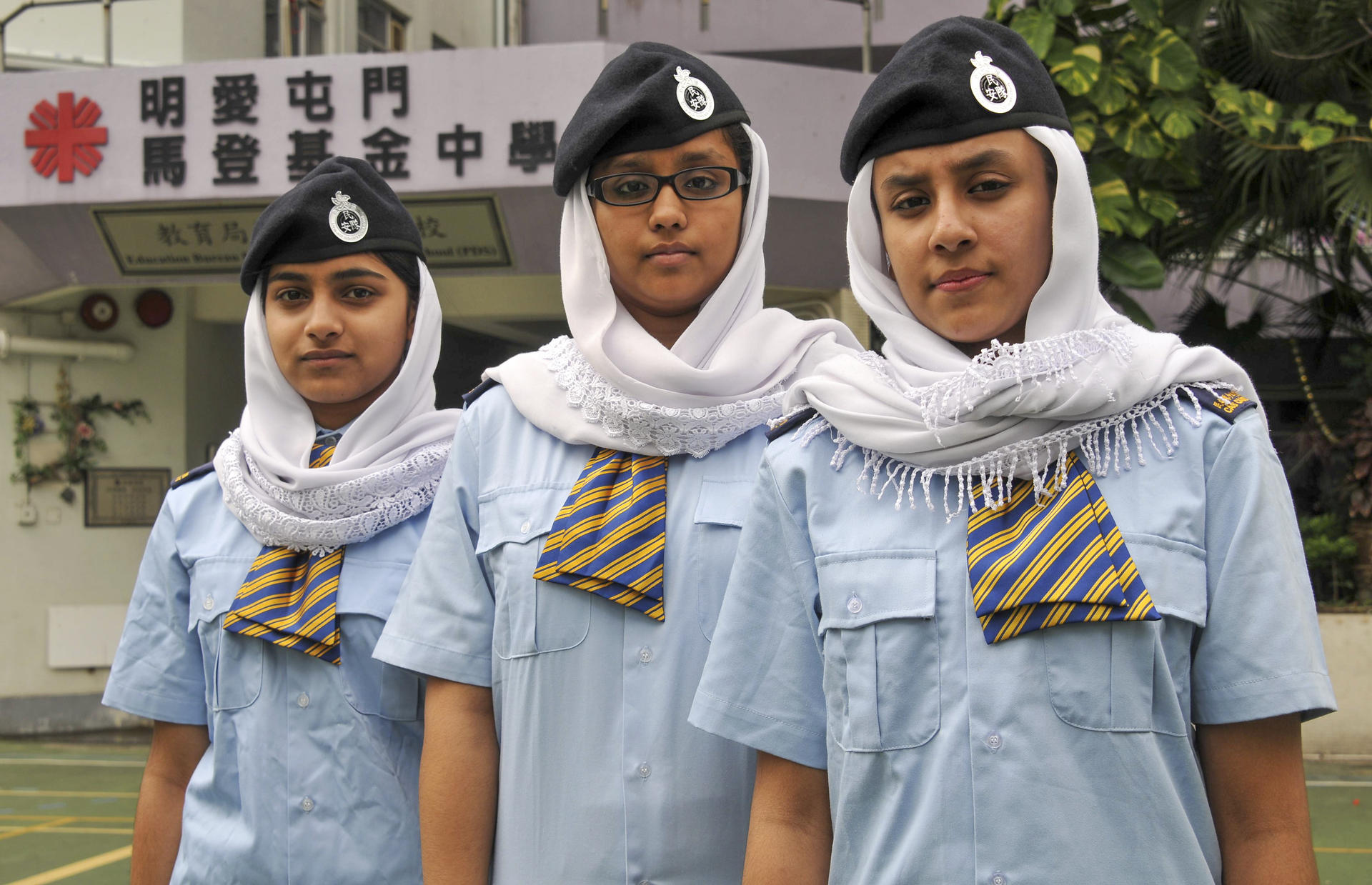 Students at Caritas Tuen Mun Marden Foundation Secondary School wear headscarves.