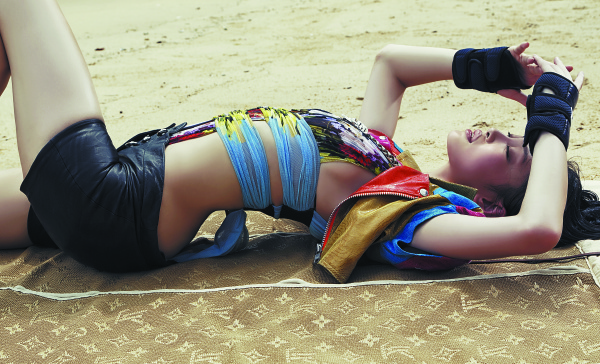 Swimsuit and leather shorts (HK$14,800) by Versace (inquiries: 2918 1008). Biker jacket (HK$6,000) from Adidas Originals by Jeremy Scott. Gloves, stylist's own. Beach mat (HK$24,500) by Louis Vuitton.