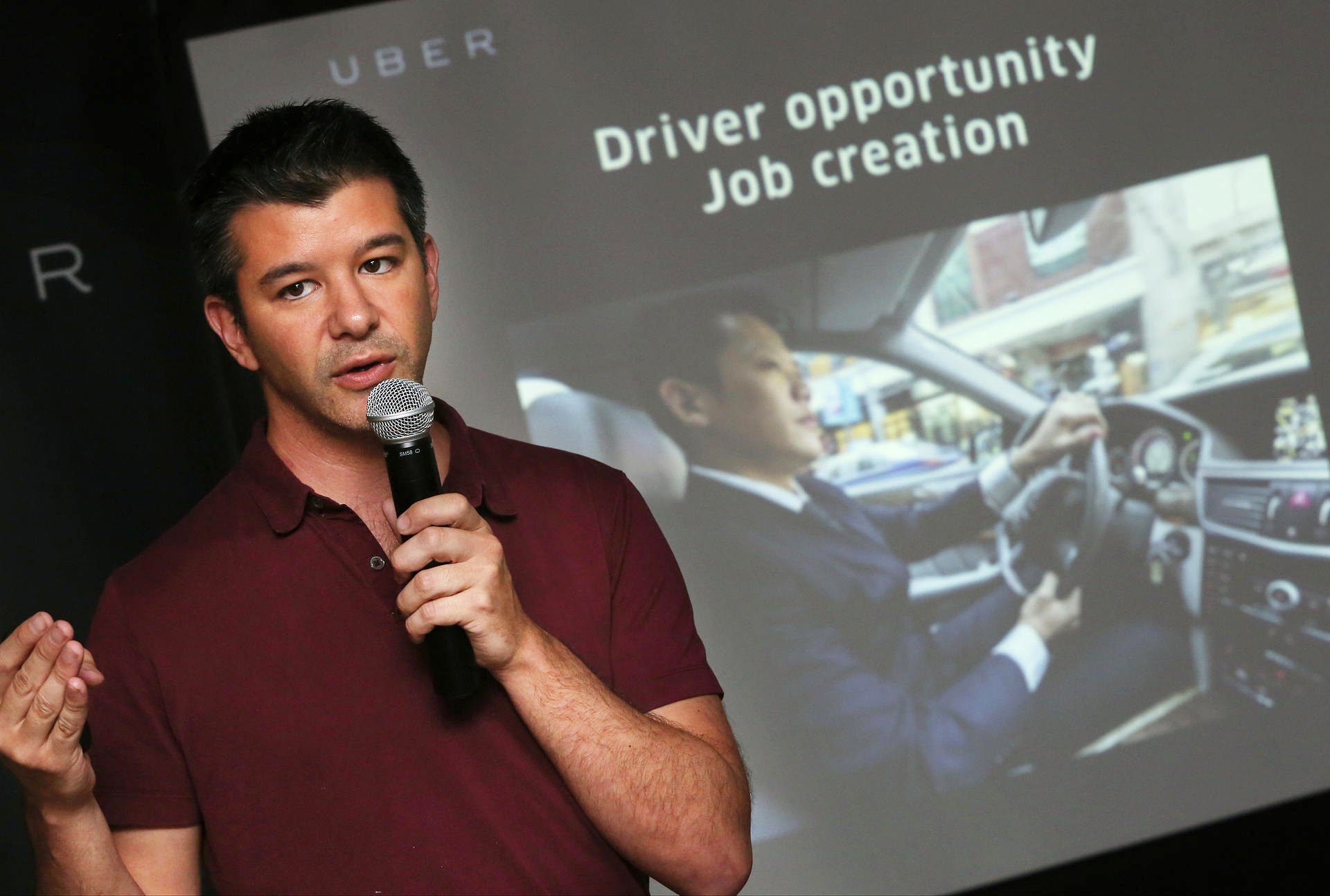 Travis Kalanick, CEO and co-founder of Uber, meets the media in Central yesterday. Photo: Sam Tsang