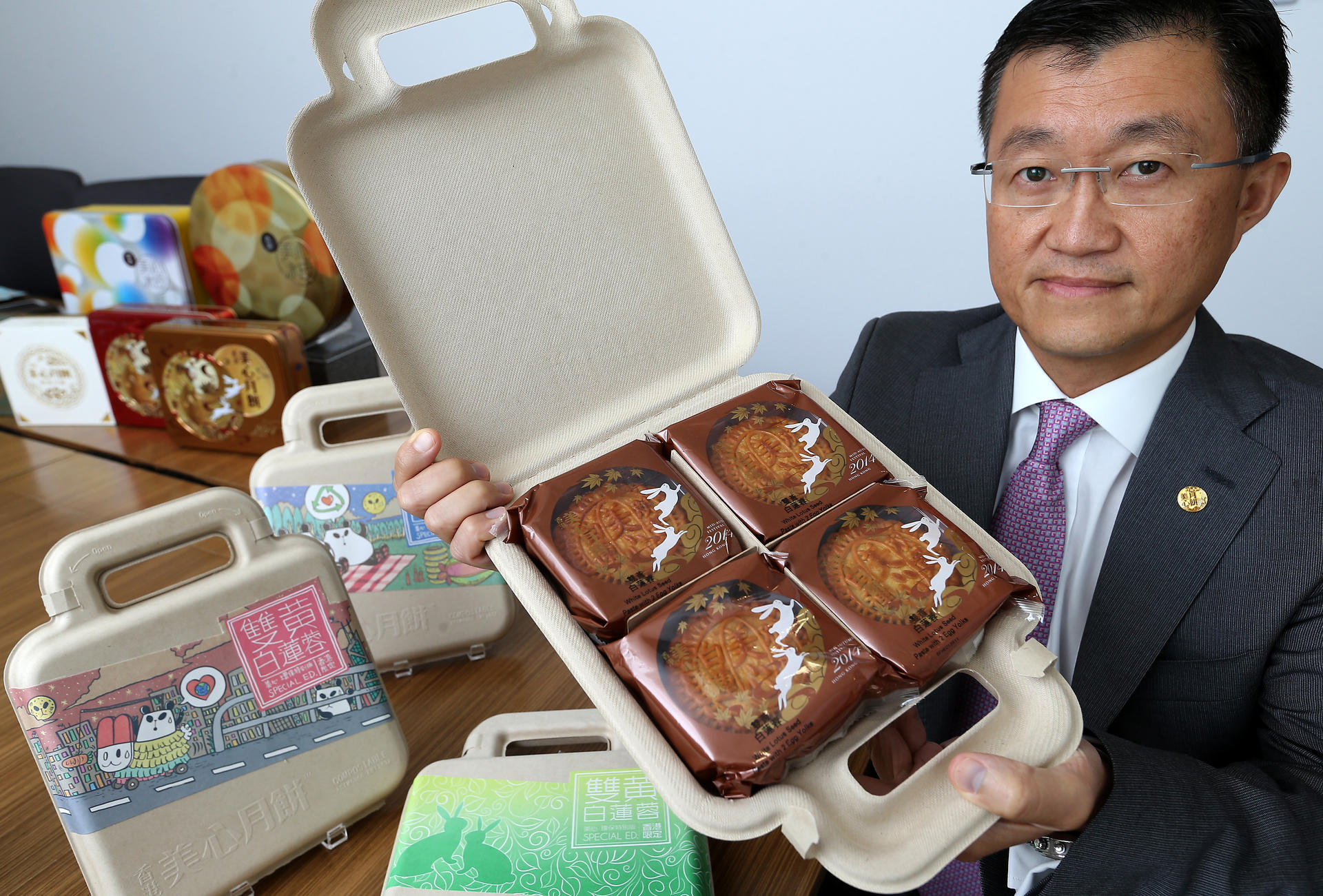 Martin Lee, of Maxim's Caterers, displays the biodegradable boxes. Photo: K. Y. Cheng