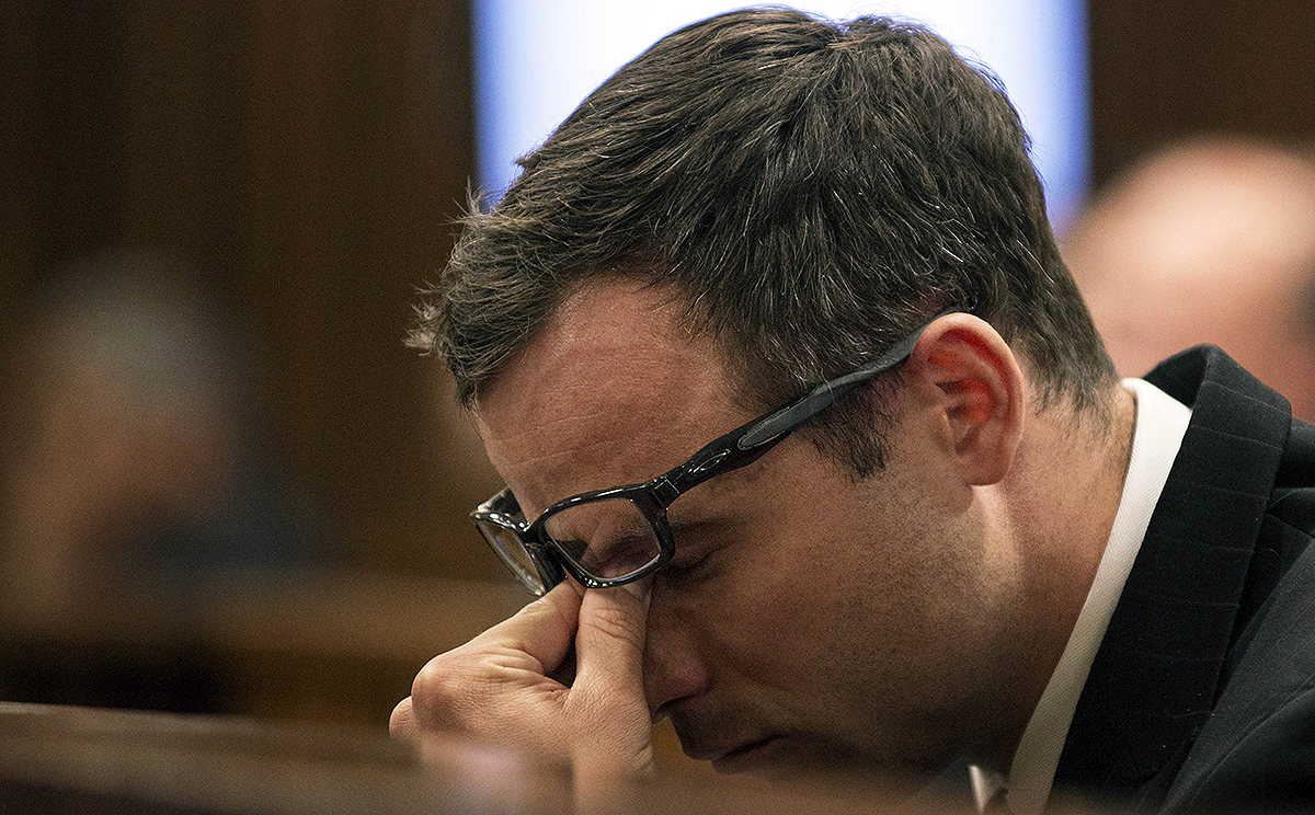 Oscar Pistorius gestures during the final arguments of his murder trial at the High Court in Pretoria. Photo: AFP