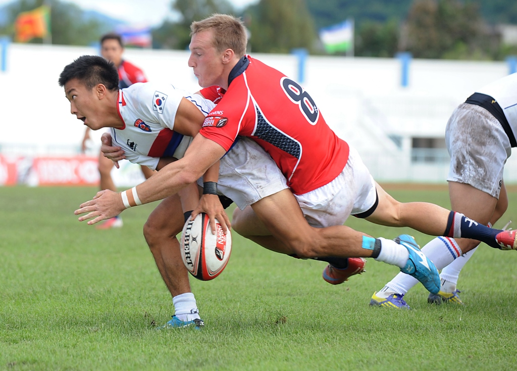 Tom McQueen in action for Hong Kong against South Korea during last year’s Asian Sevens Series’ event in Singapore. The opening leg of the 2014 series will take place in Hong Kong for the first time next weekend. Photo: SCMP Pictures