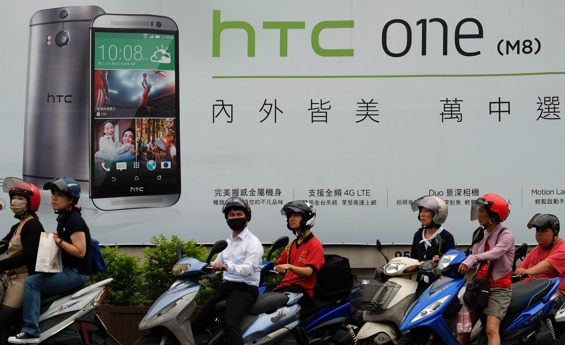 HTC's One M8 is out of reach of many mainlanders. Photo: AFP