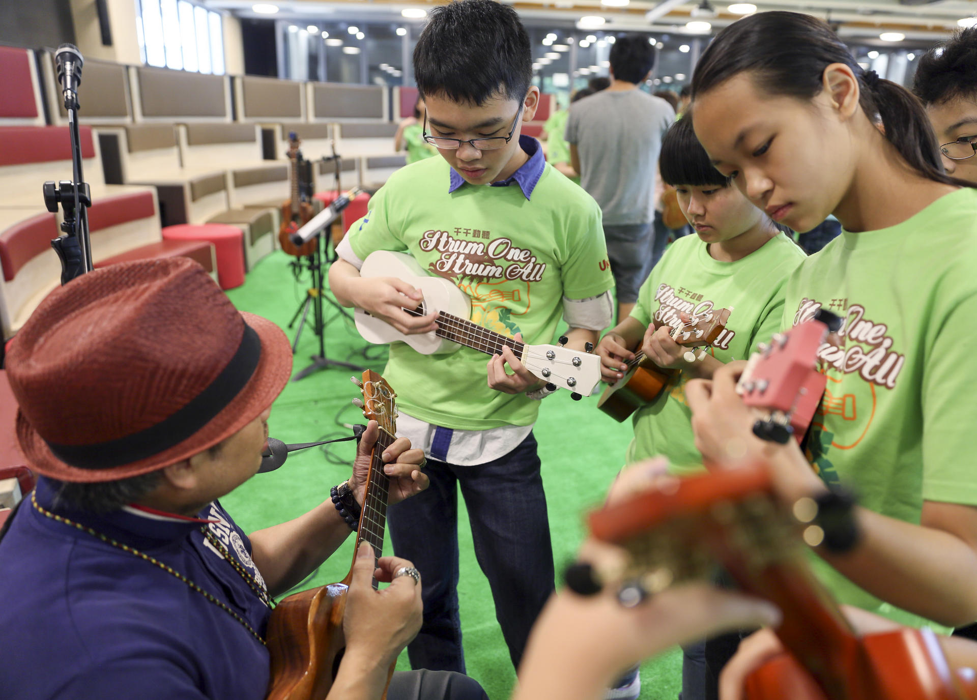 The Strum One, Strum All ukulele jam session allows novices to play alongside professional musicians.