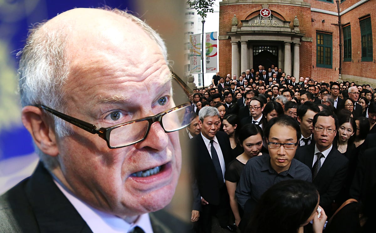 The UK Supreme Court's president Lord Neuberger (left) says he saw "no present problem" with the city's rule of law. Hundreds of Hong Kong lawyers stage three minutes of silence outside the Court of Final Appeal in Hong Kong, following a march in protest against Beijing's policy towards the judiciary, on June 27, 2014. Photos: Sam Tsang, Felix Wong