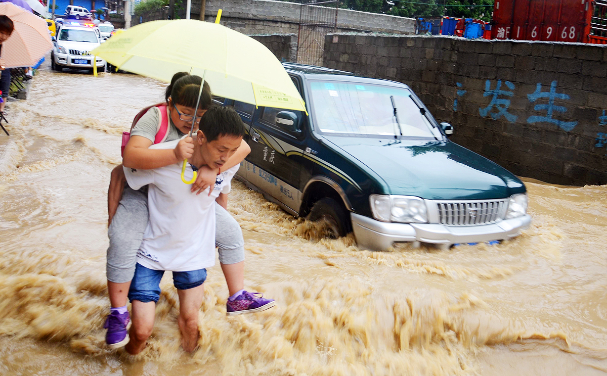 A road is flooded in Wuxi County, southwest China's Chongqing Municipality. Photo: Xinhua 