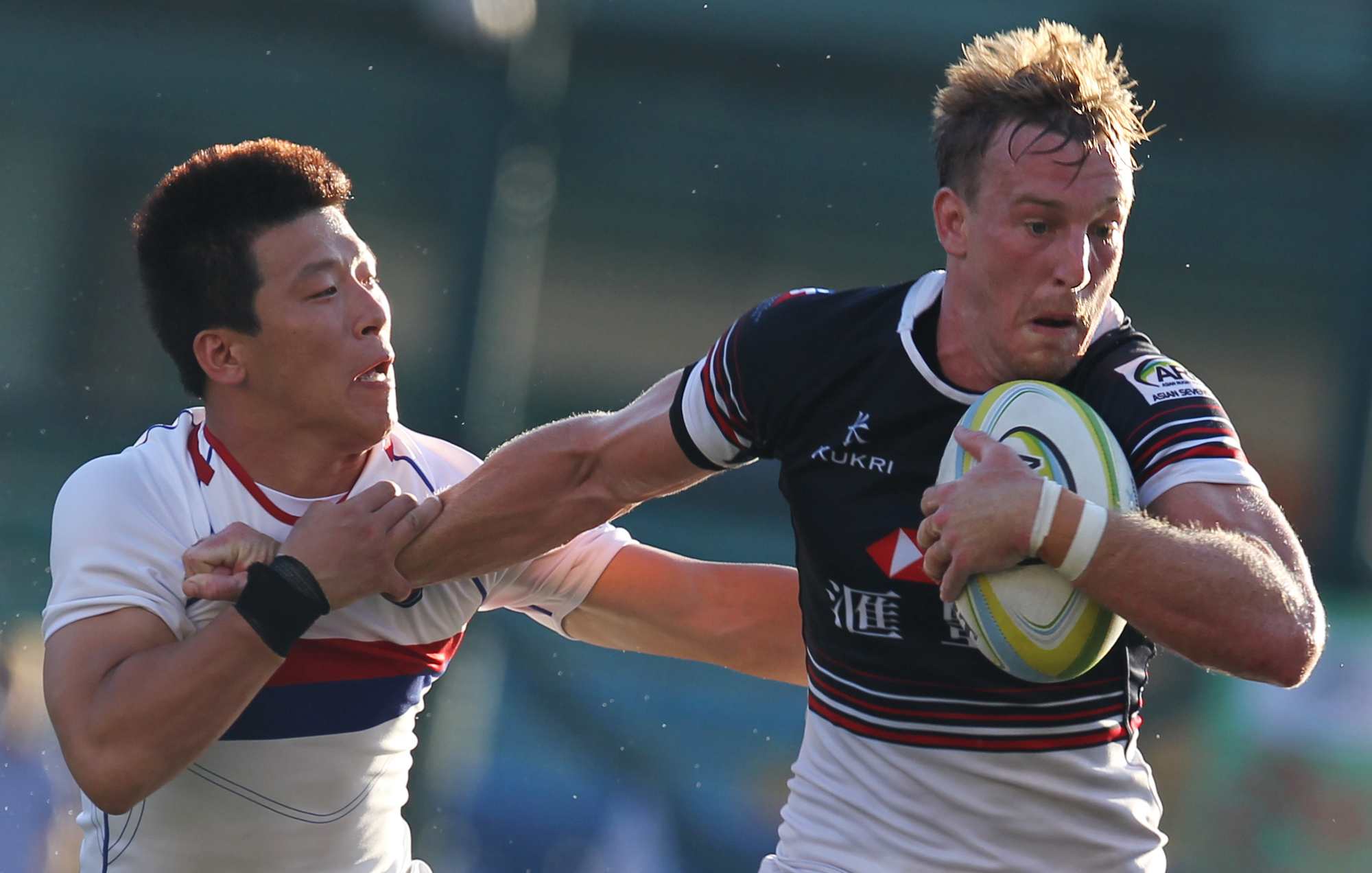 Alex McQueen on the charge during Hong Kong's 40-0 victory over South Korea to clinch the first leg of the Asian Sevens Series. Photos: Felix Wong/SCMP