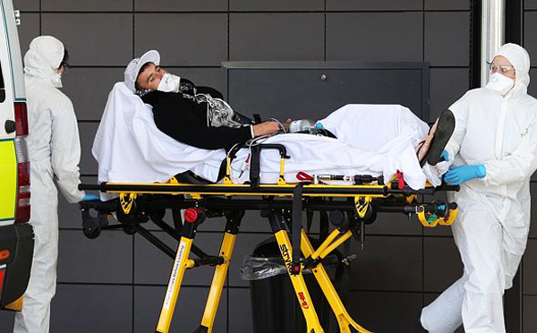 A man suspected of having the Ebola virus arrives at the Emergency department of the Gold Coast University Hospital. Photo: Gold Coast Bulletin