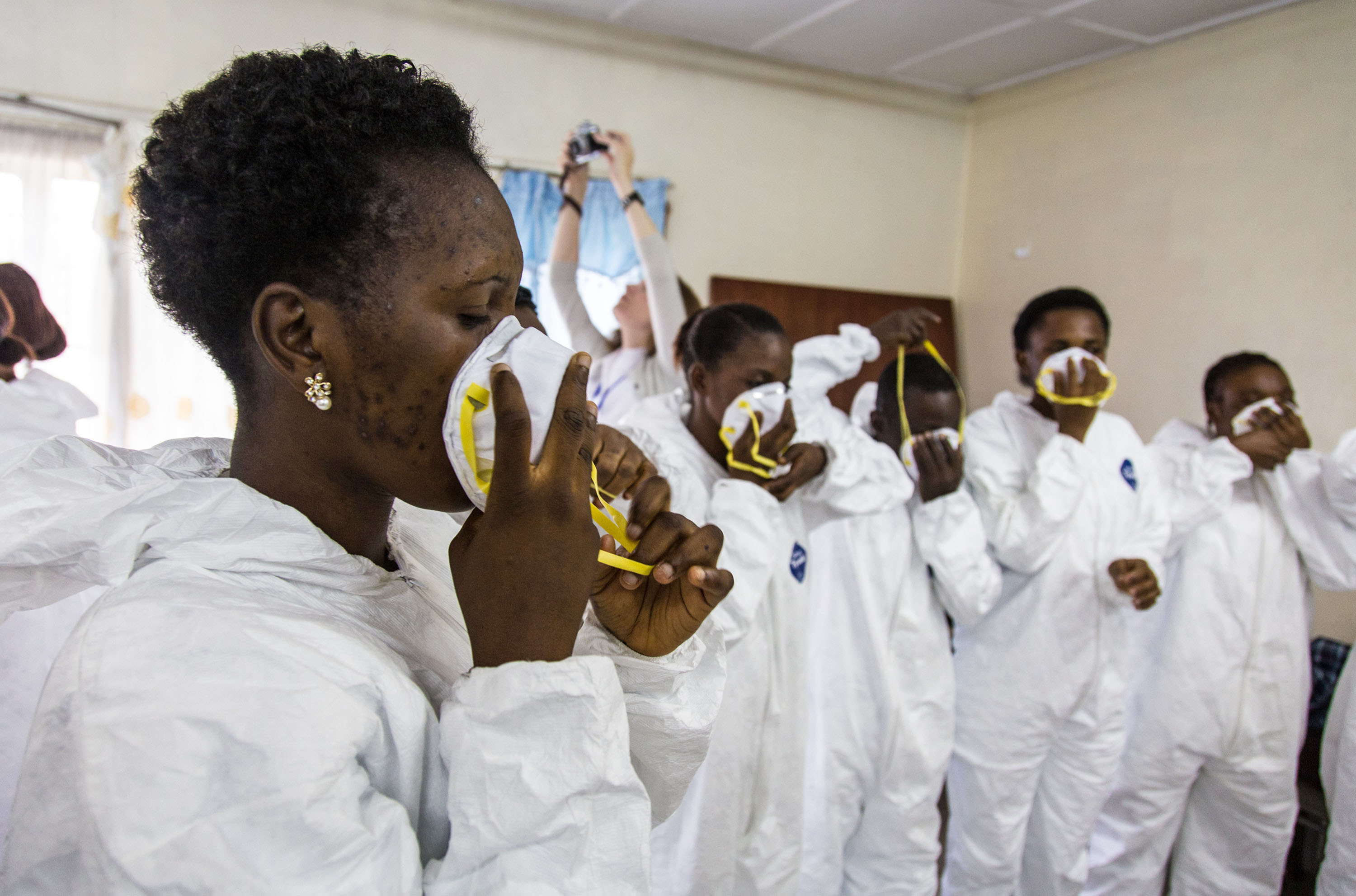 Nurses in Sierra Leone learn to use protective gear to prevent the spread of Ebola. Photo: AP