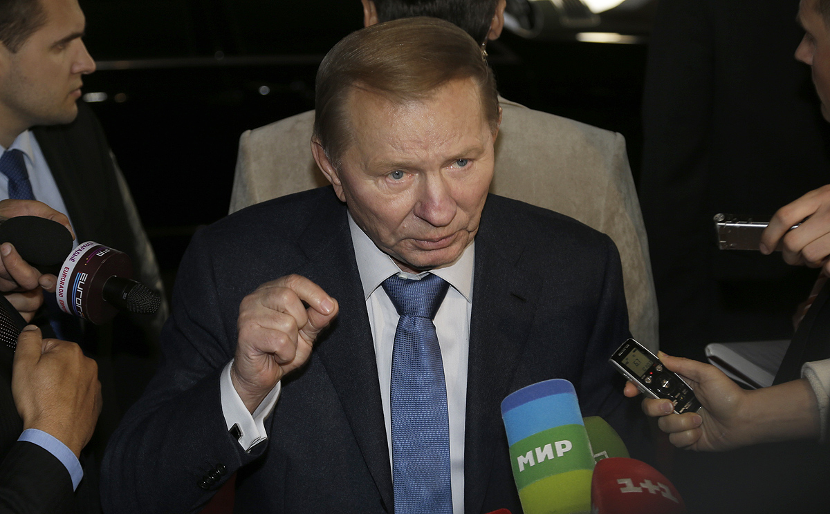 Former Ukrainian president Leonid Kuchma speaks to the media as he arrives to take part in peace talks in Minsk, Belarus on Friday. Photo: AP