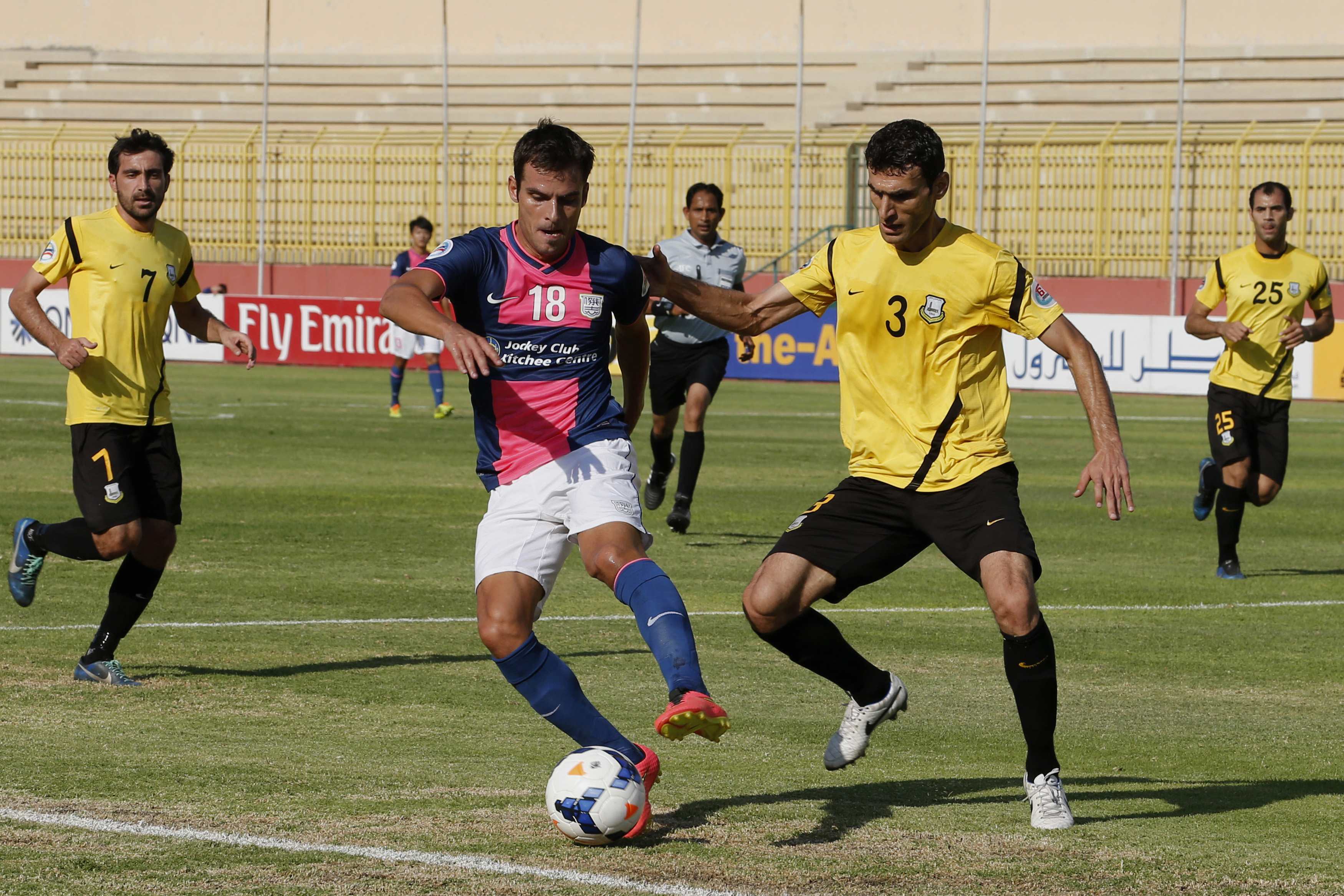 Arbil's Hardi Seyamand (right) fights for possession of the ball with Hong Kong's Jorge Tarres in their AFC Cup first-leg semi-final soccer match in Zarqa city, near Amman. Photo: Reuters 