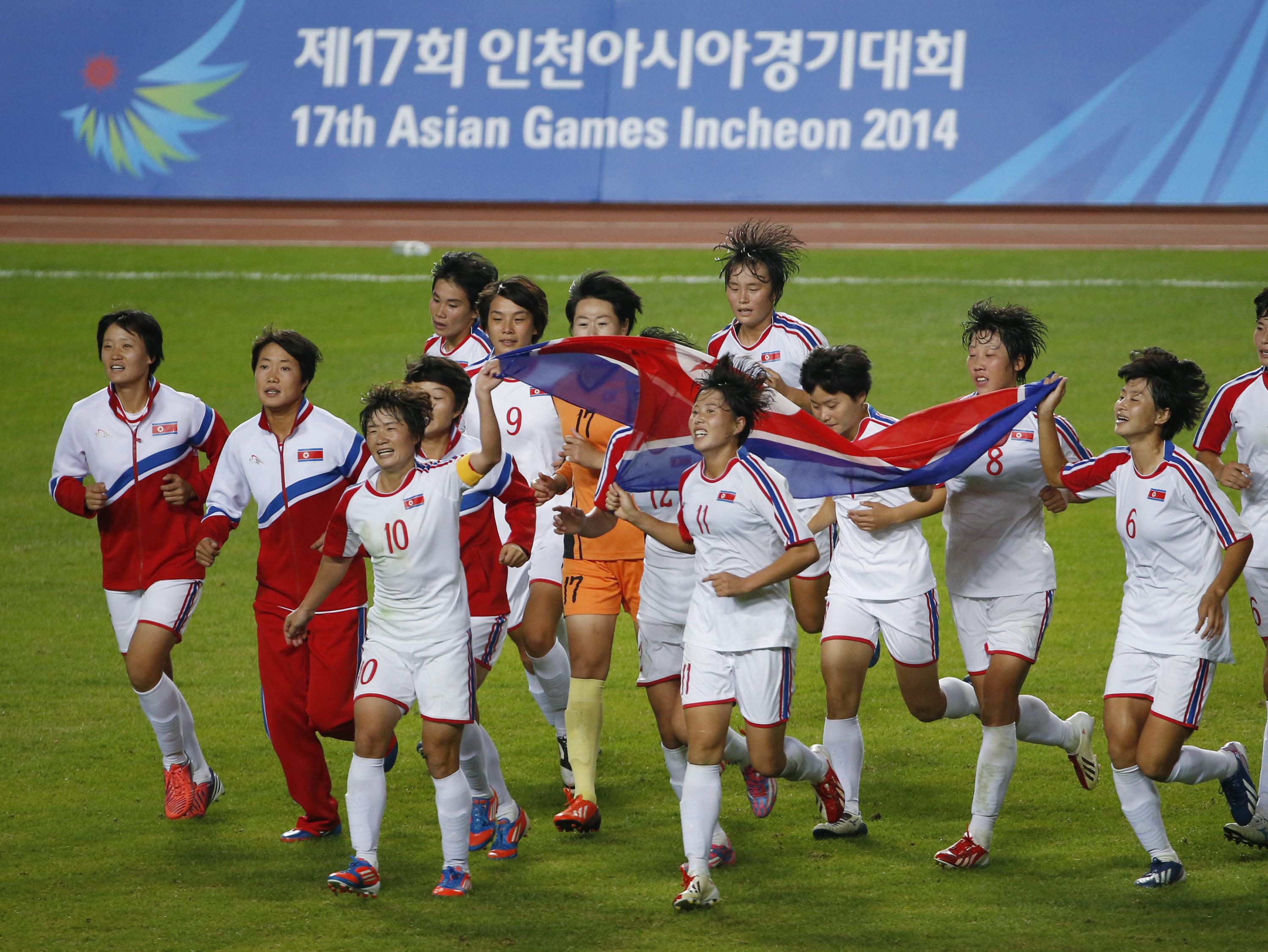 The North Korean women's football team won the gold medal in Incheon. Will their male counterparts do the same against their southern neighbours? Photo: AP