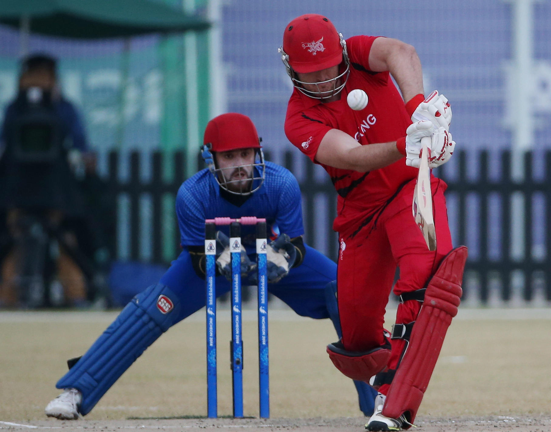 Jamie Atkinson at the wicket against Afghanistan. Photo: Nora Tam