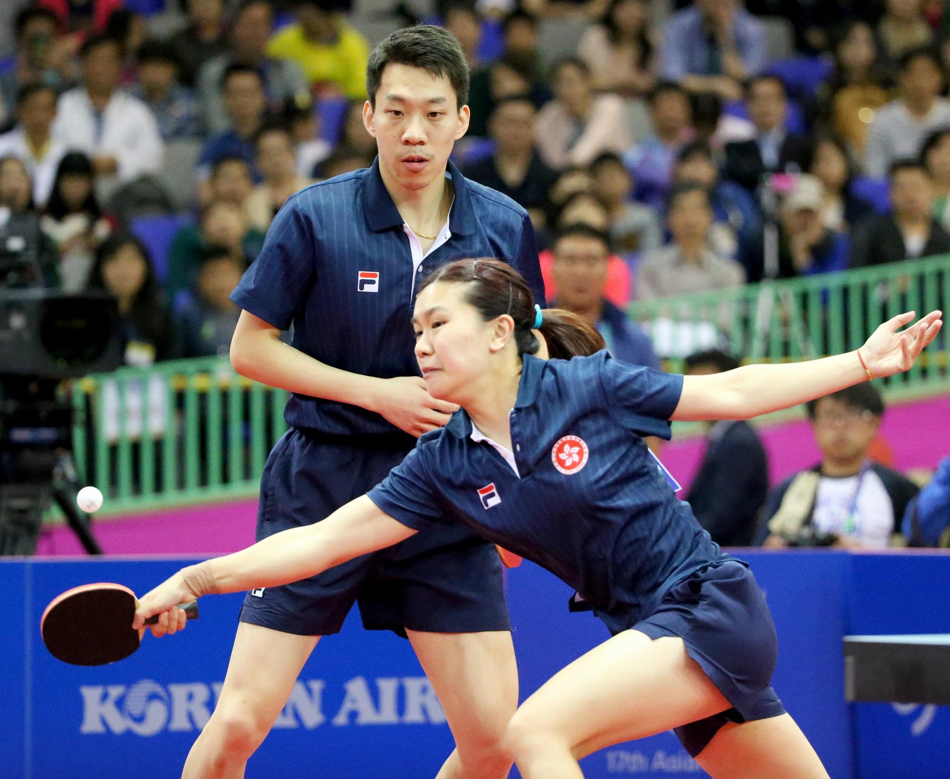 Hong Kong's Jiang Tianyi and Lee Ho-ching in action during the table tennis mixed doubles final against North Korea. Photo: Nora Tam