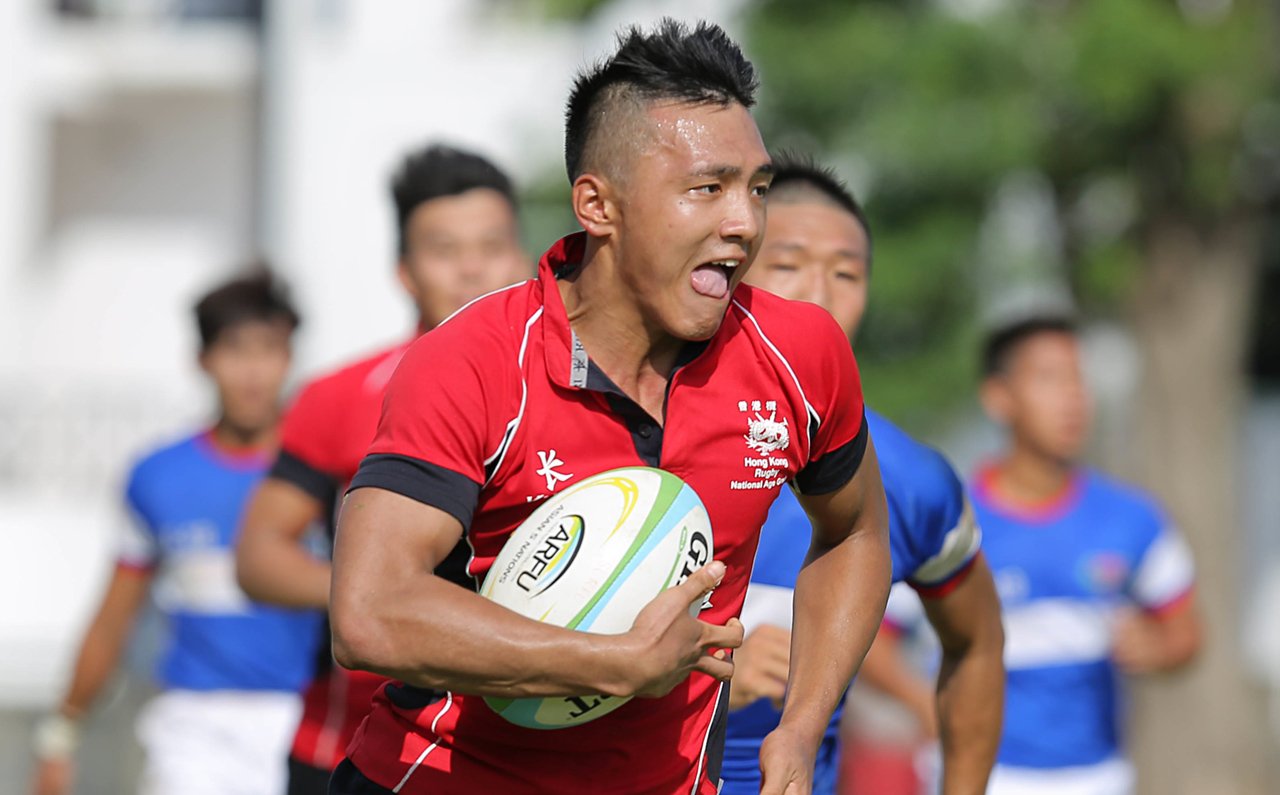 Eric Kwok Pak-nga spots a gap as he runs in try number six for Hong Kong against Taiwan in the ARFU Asian qualifiers for the 2015 IRB Junior World Rugby Trophy. Hong Kong won the match 44-5. Photo: Dennis Muthuthantri for HKRFU