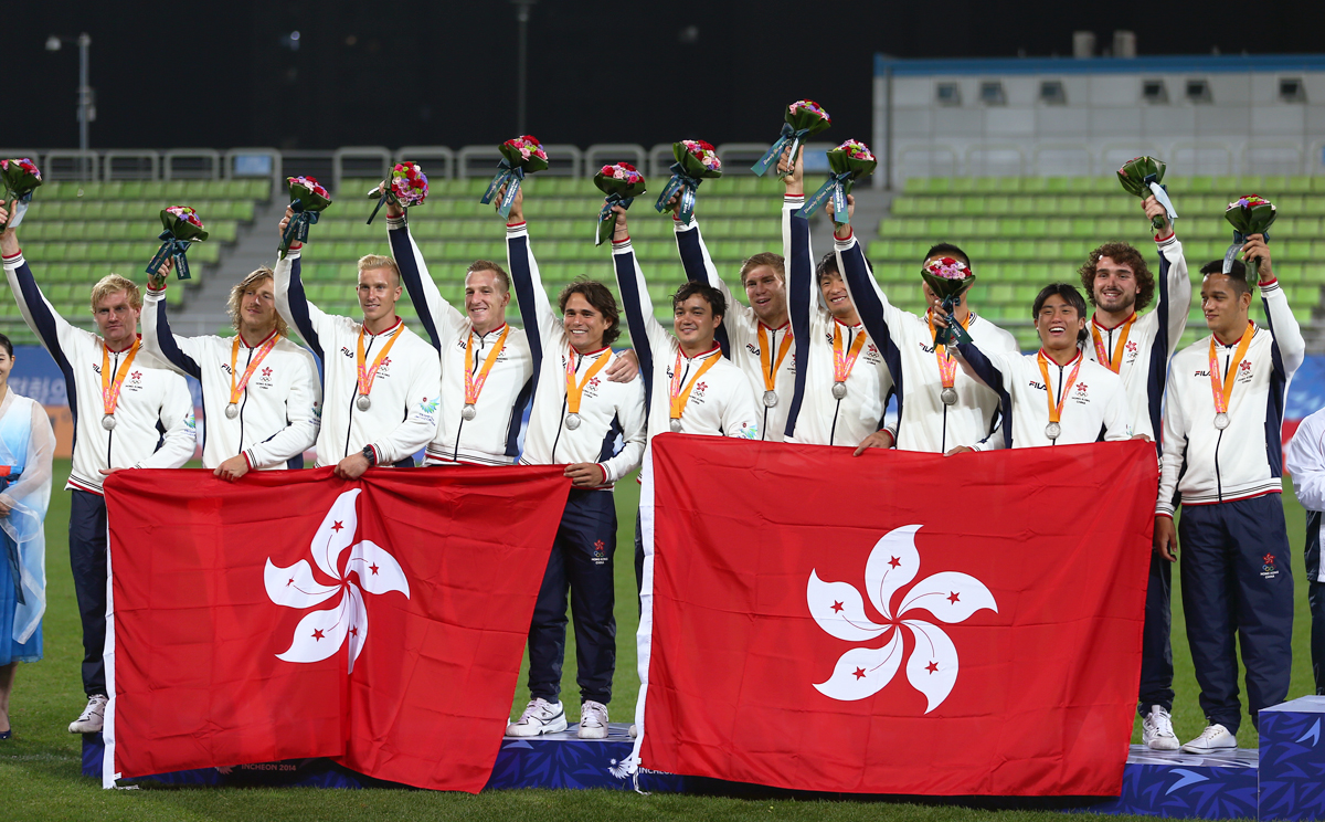 Silver medalists players of China's Hong Kong pose on the podium during the awarding ceremony of the men's rugby contest at the 17th Asian Games in Incheon, South Korea. Photo: Xinhua