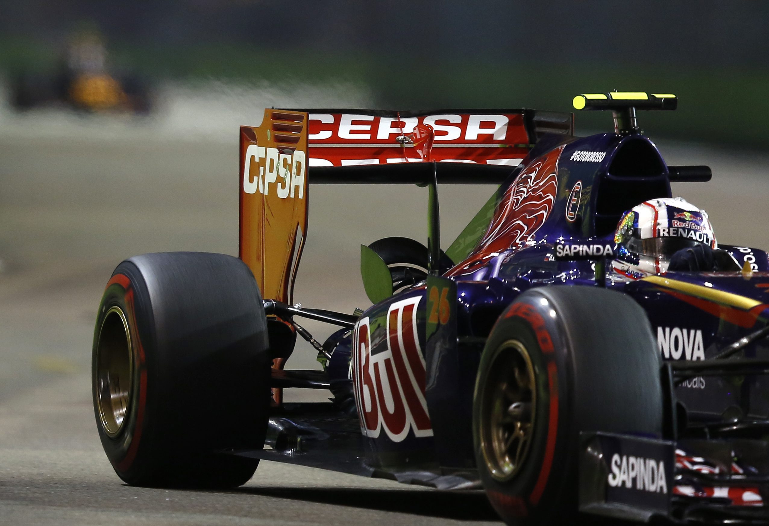 Russian F1 driver Daniil Kyvat of the Toro Rosso team steers his car in a practice session on the street circuit of the Singapore Grand Prix. Photo: EPA