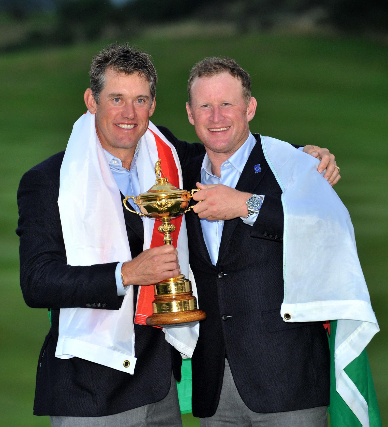 Lee Westwood with Jamie Donaldson after Team Europe retain the Ryder Cup at Gleneagles. Photo: AFP