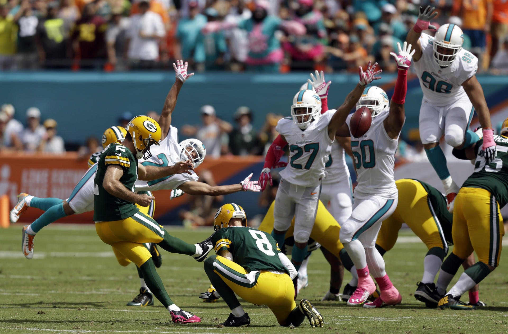 Green Bay kicker Mason Crosby boots a field goal in the NFL game against Miami Dolphins, which the Packers won 27-24. Photo: AP