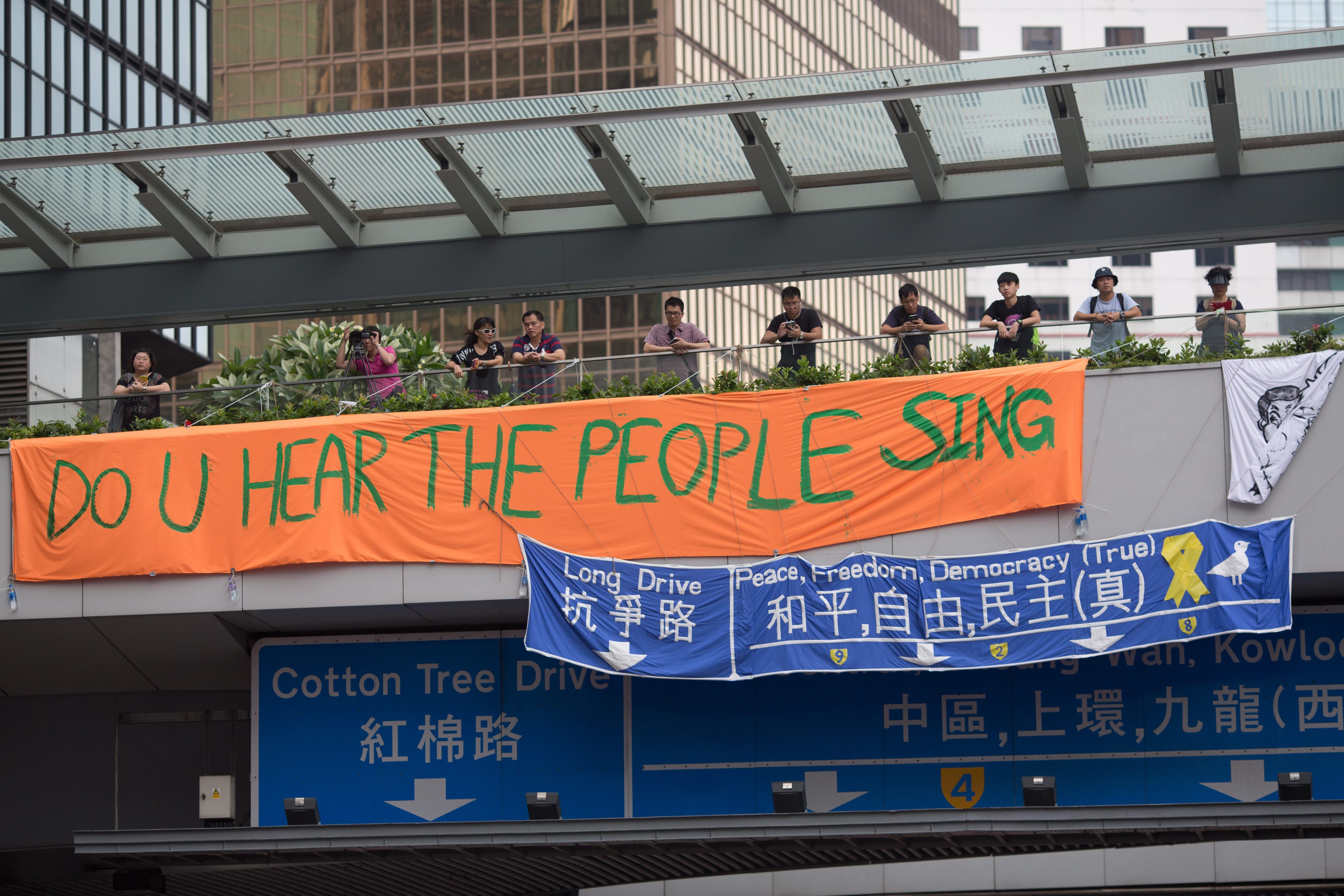 A lack of trust in the Hong Kong and Beijing governments led students to raise their banners, and citizens to come out onto the streets. Photo: EPA