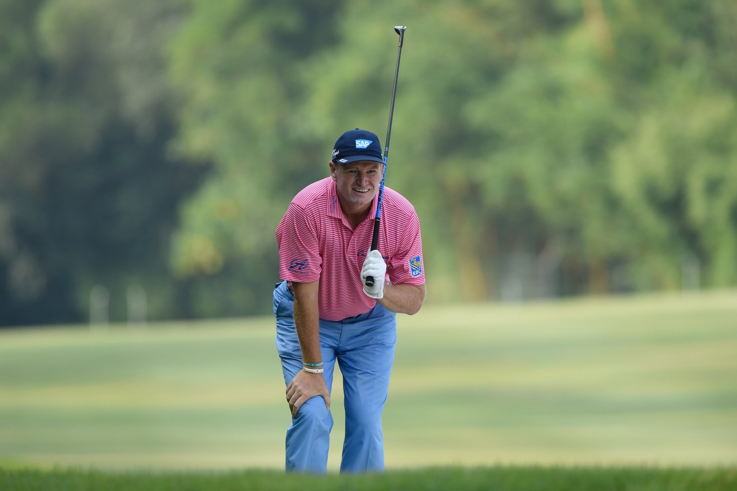 Ernie Els lines up a shot on his way to a 66. Photo: Richard Castka