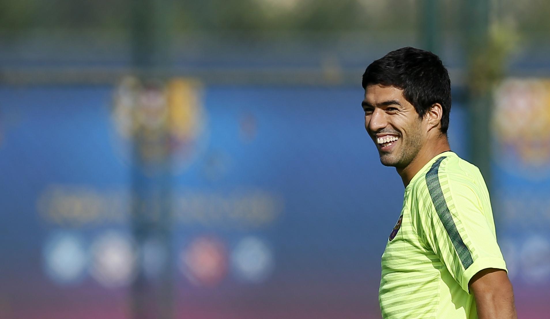 Luis Suarez makes Atletico Madrid smile