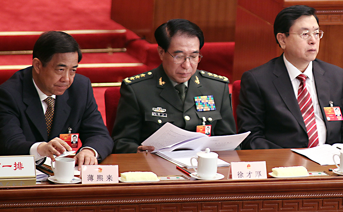 Bo Xilai (left), Xu Caihou (centre) and Zhang Dejiang attend the opening of the Fifth Session of the 11th National People's Congress in Beijing in 2012. Photo: Simon Song