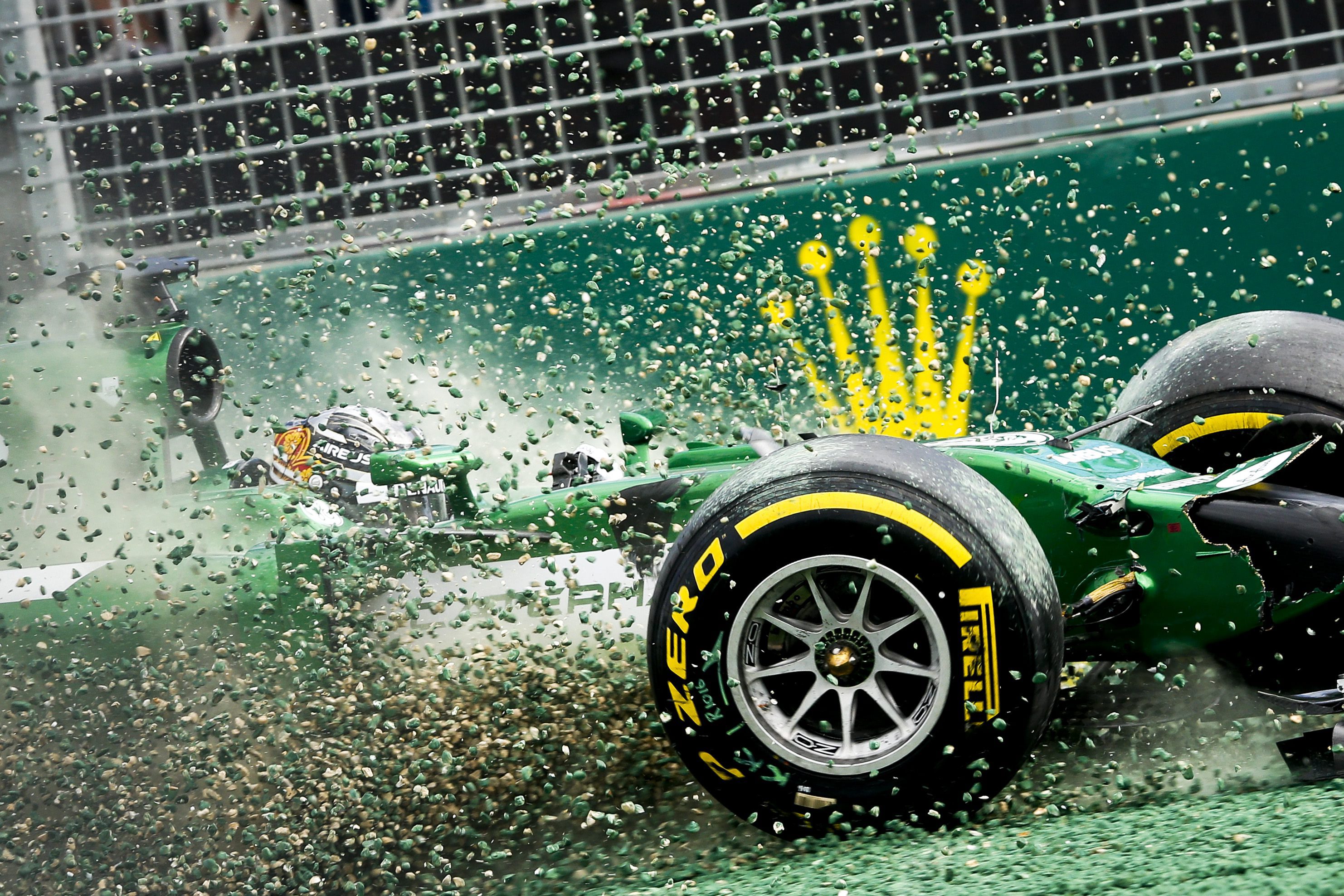 Japan's Kamui Kobayashi of the Caterham team hits the gravel bed after crashing in the Australian Grand Prix in March. It has been all downhill since for Caterham who have gone bust. Photo: EPA