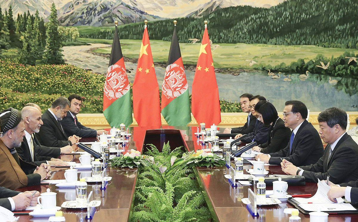 Premier Li Keqiang (second right) meets with visiting Afghan President Ashraf Ghani (second left) in Beijing on Wednesday. Photo: Xinhua