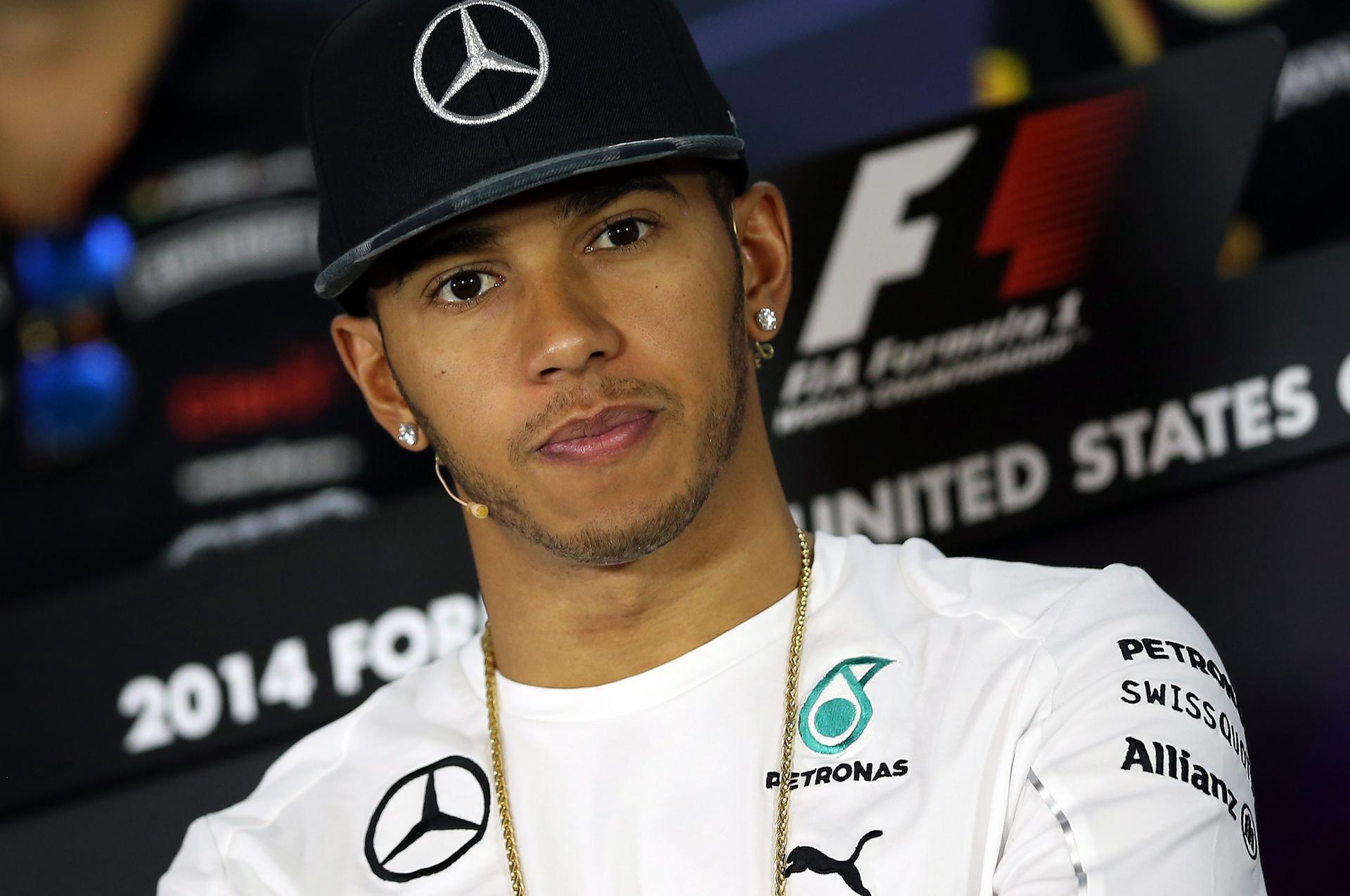 Lewis Hamilton leads the drivers' championship with three rounds to go. Photo: EPA