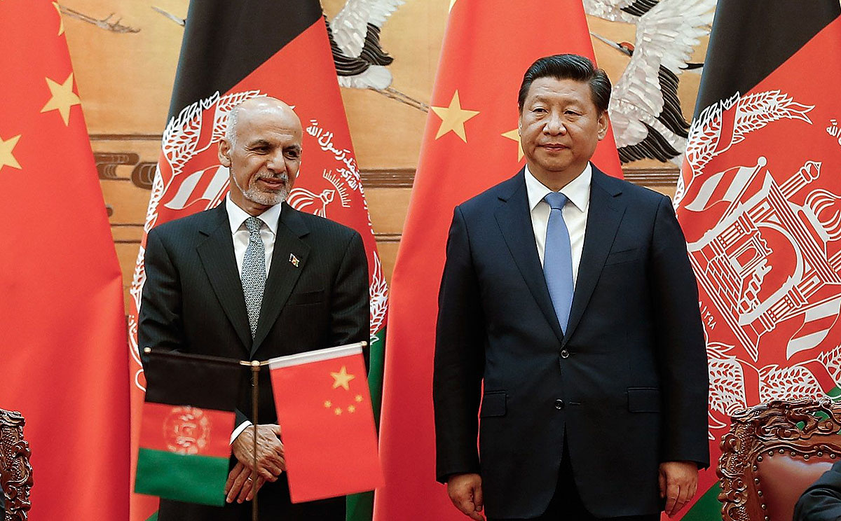 Afghan President Ashraf Ghani with President Xi Jinping at the Great Hall of the People in Beijing on Tuesday. Photo: AFP