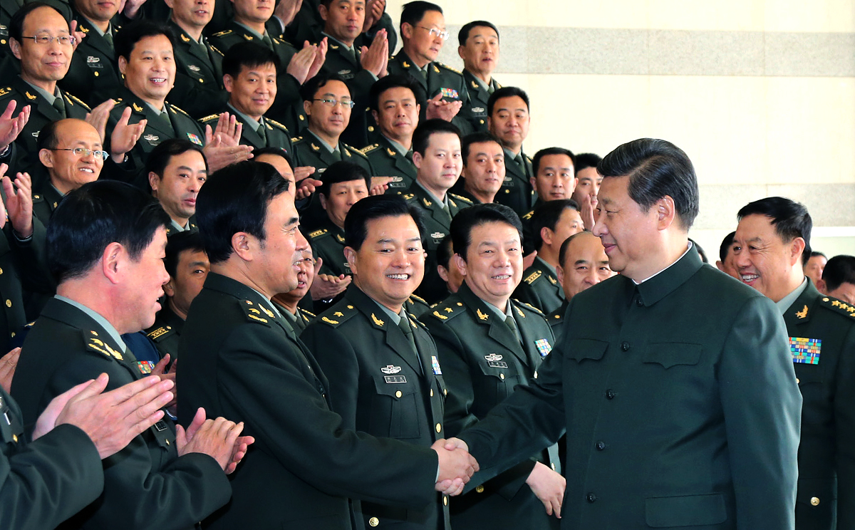 President Xi Jinping shakes hands with division commanders at the Jinan Military Area Command in Jinan, Shandong. Photo: Xinhua