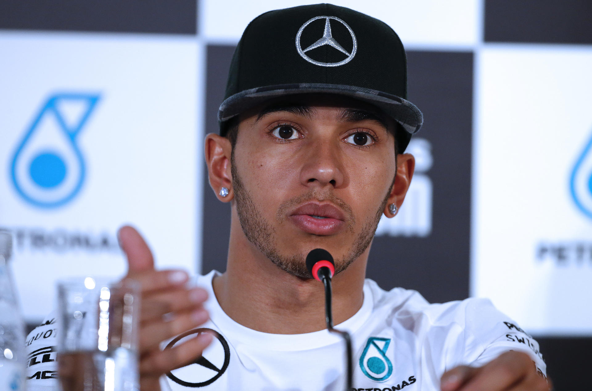 Lewis Hamilton says he will keep his head down and just keep chipping away in the race for the F1 championship. Photos: AP