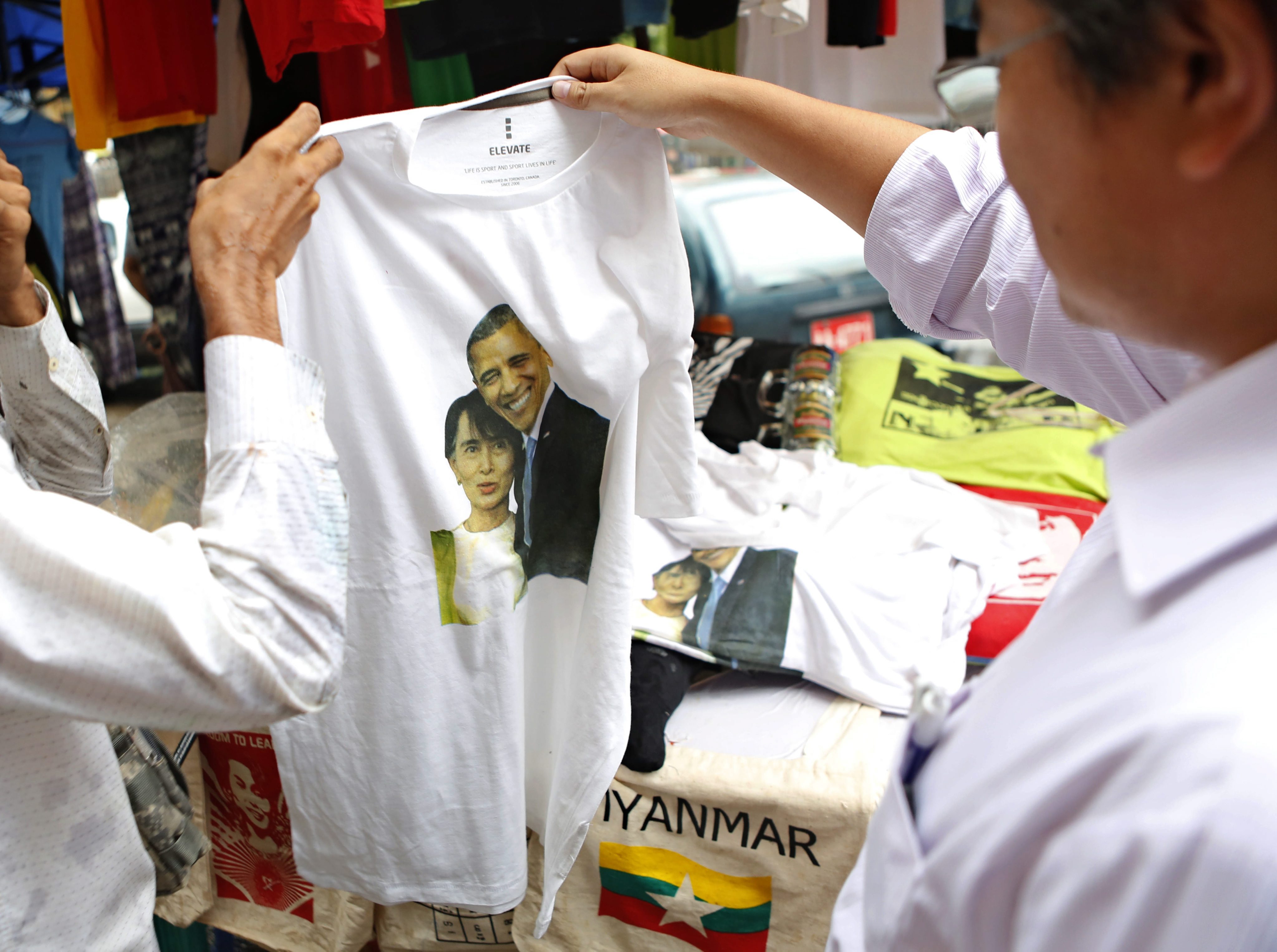 A T-shirt featuring the picture of US President Barack Obama and Myanmar opposition leader Aung San Suu Kyi at a shop in Yangon. Obama is expected at the upcoming East Asia Summit hosted by Myanmar. Photo: EPA