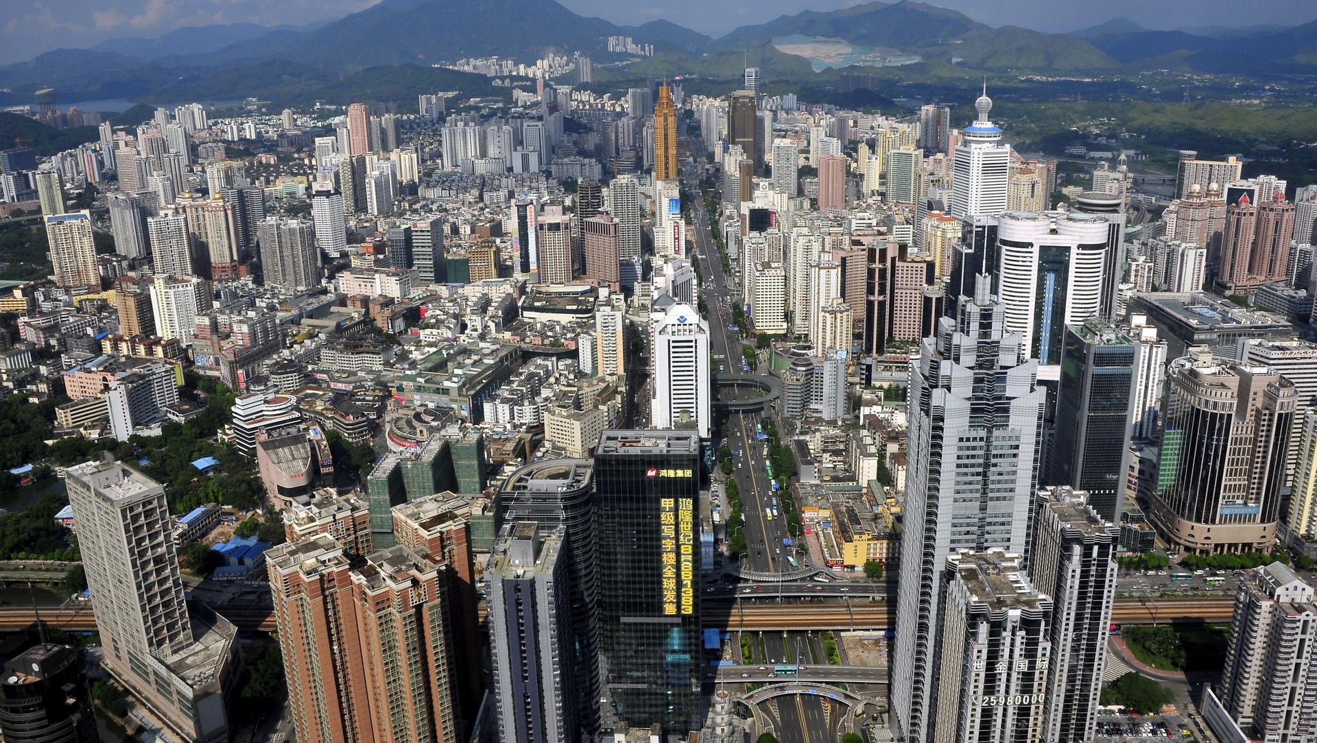 High-rise office and apartment buildings in Shenzhen, where clients are often more receptive to bolder design ideas. Photo: Imaginechina