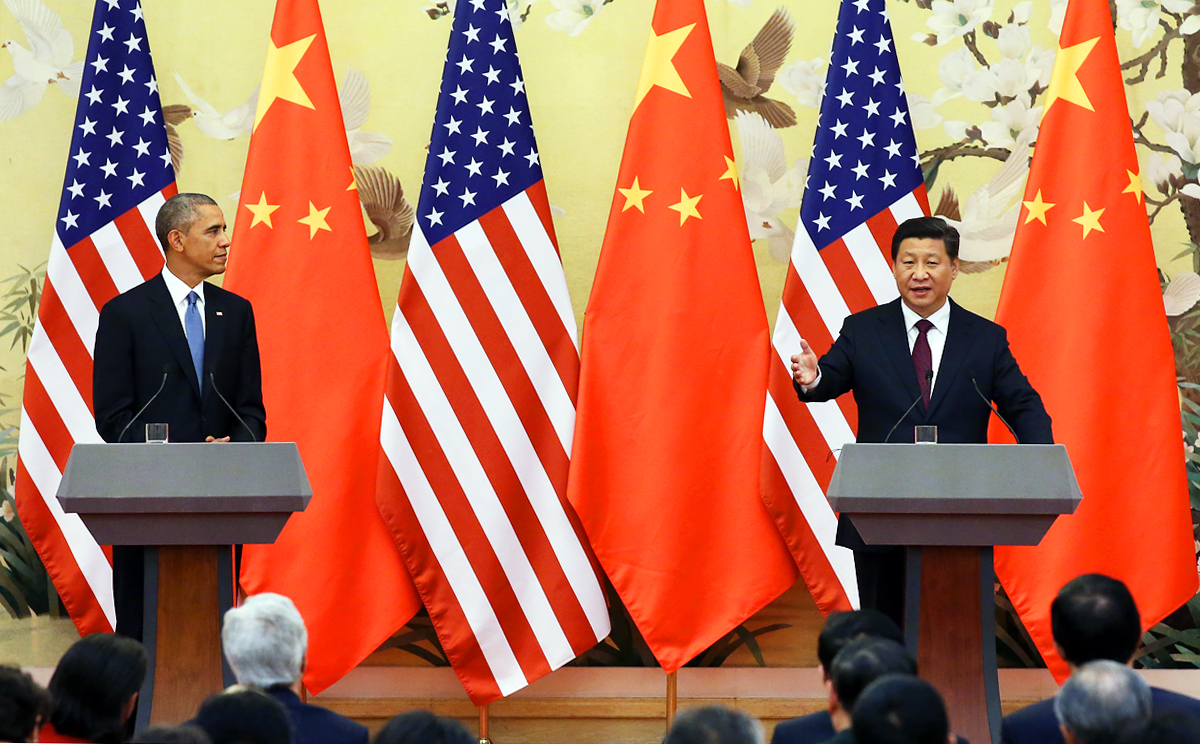 Obama and Xi take questions from the press in Beijing. Photo: AFP