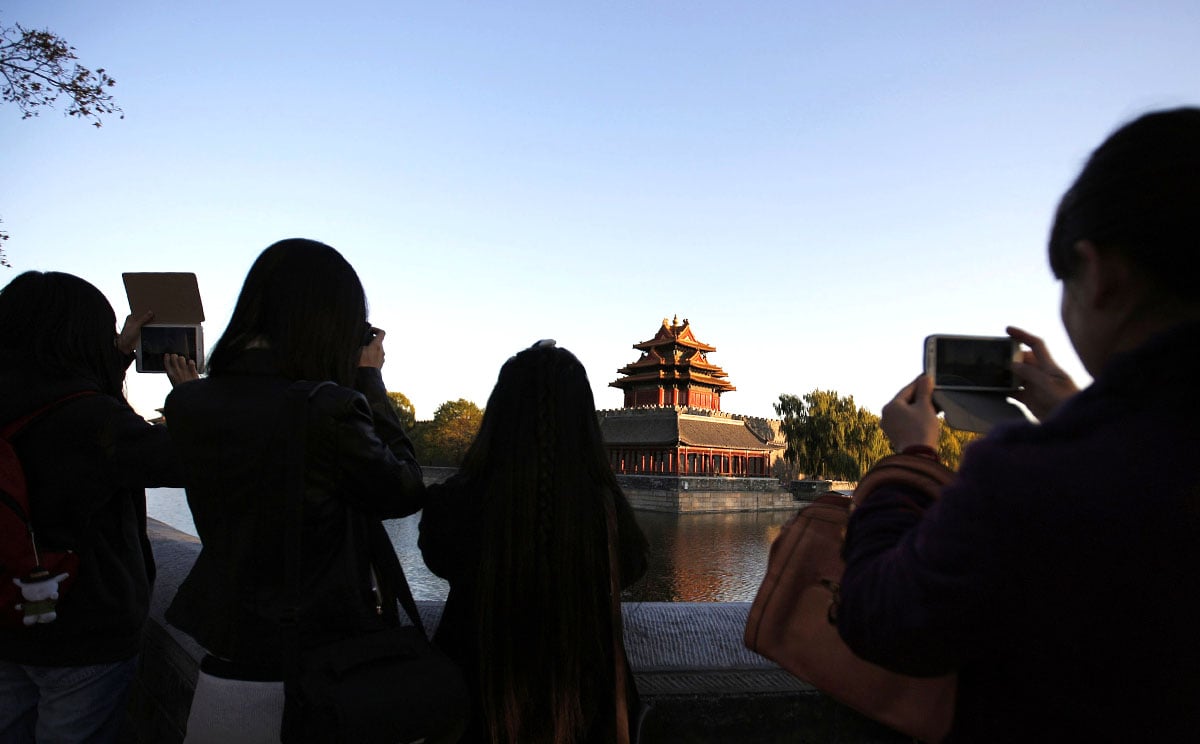 Beijing has been enjoying rare blue skies in an otherwise smoggy season due to the city's all-out effort to engineer a few smoke-free days during the Apec summit. Photo: Reuters