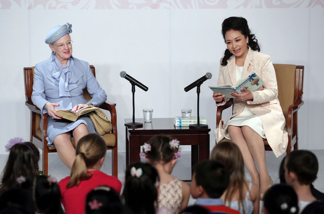 Denmark's Queen Margrethe II (left) read fairy tales with first lady Peng Liyuan during a visit to Beijing in April. Photo: Reuters