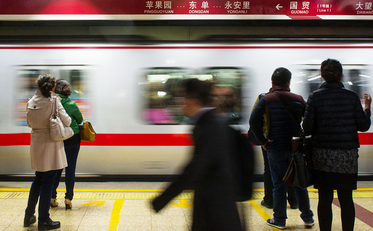 The Chinese government will continue to partly subsidise the cost of travelling on Beijing's subway and buses, despite next month's planned changes. Photo: Xinhua