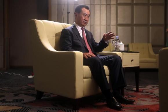 Wang Jianlin, chairman of Chinese property developer Dalian Wanda Group, answers a question during an interview. Photo: Reuters