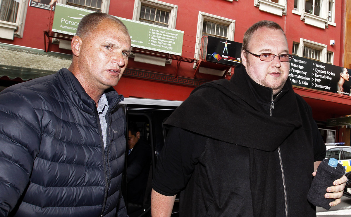 Kim Dotcom (right) arrives at Auckland District Court in Auckland, New Zealand on November 27, 2014. Photo: AP