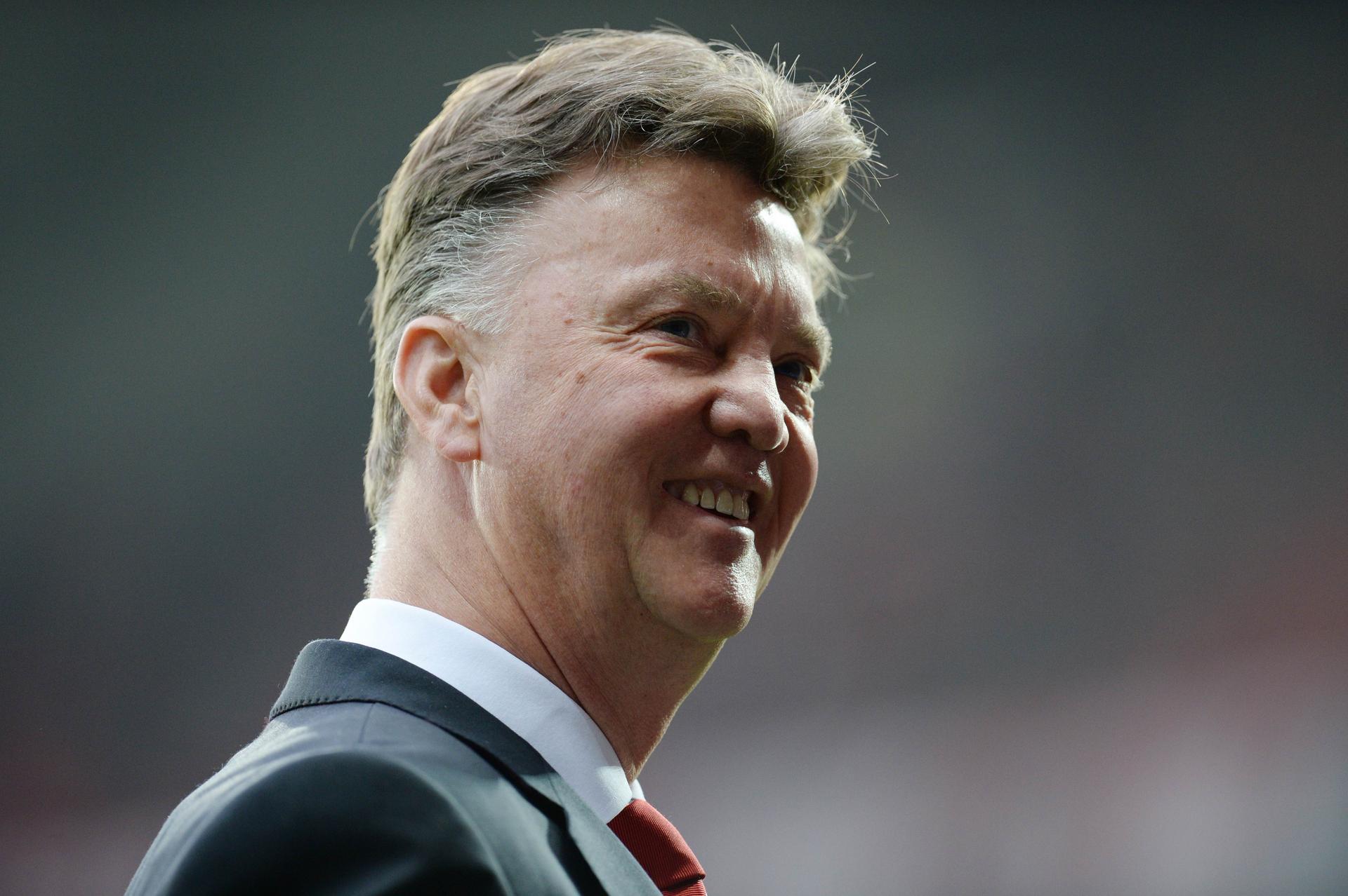 United's Dutch manager Louis van Gaal can smile for now. Photo: AFP