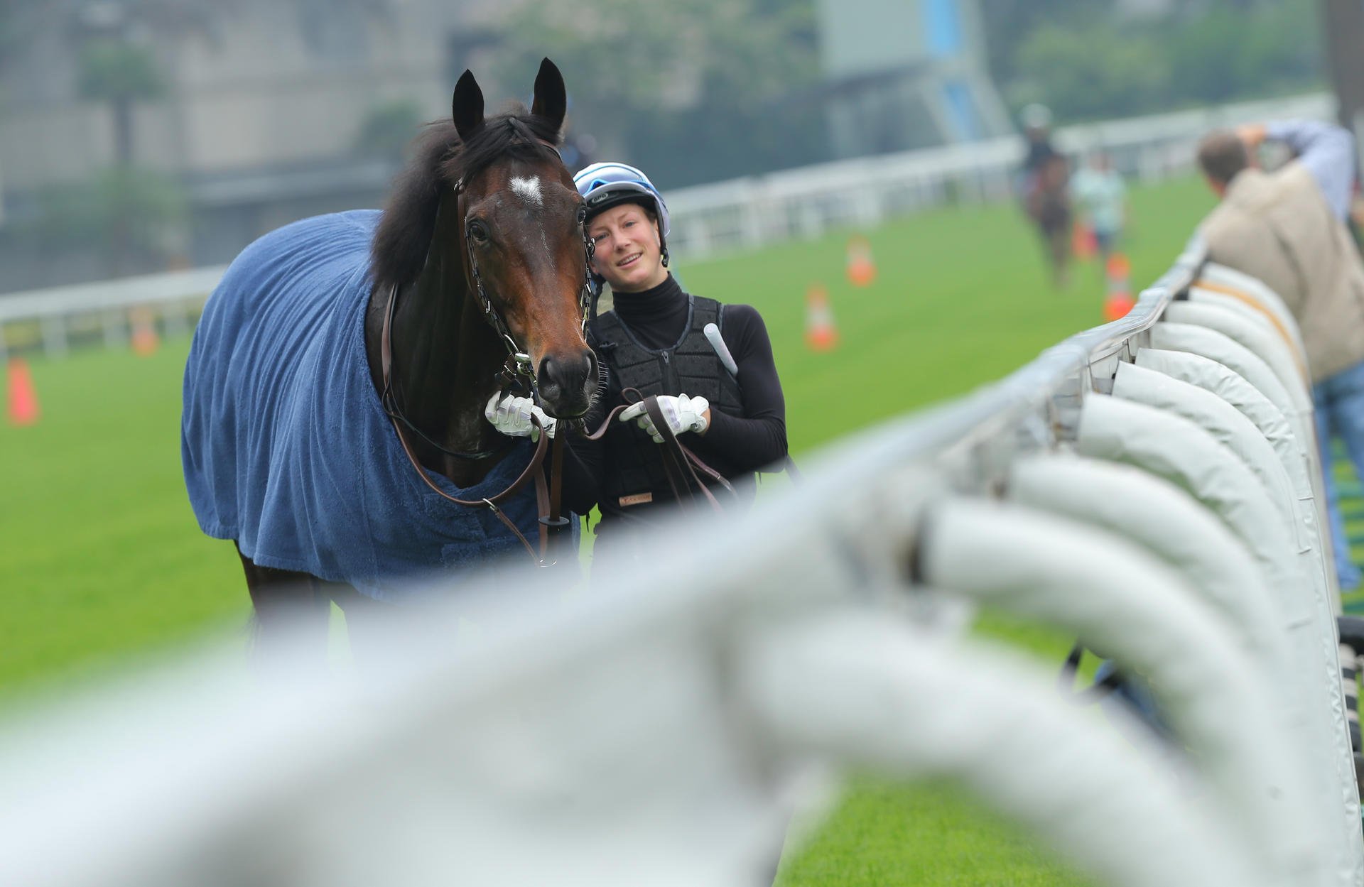 Work rider Annelie Ackerman walks Flintshire back to the stable after a steady gallop in readiness for Sunday's HK$16.5 million Longines Hong Kong Vase at Sha Tin. Photos: Kenneth Chan