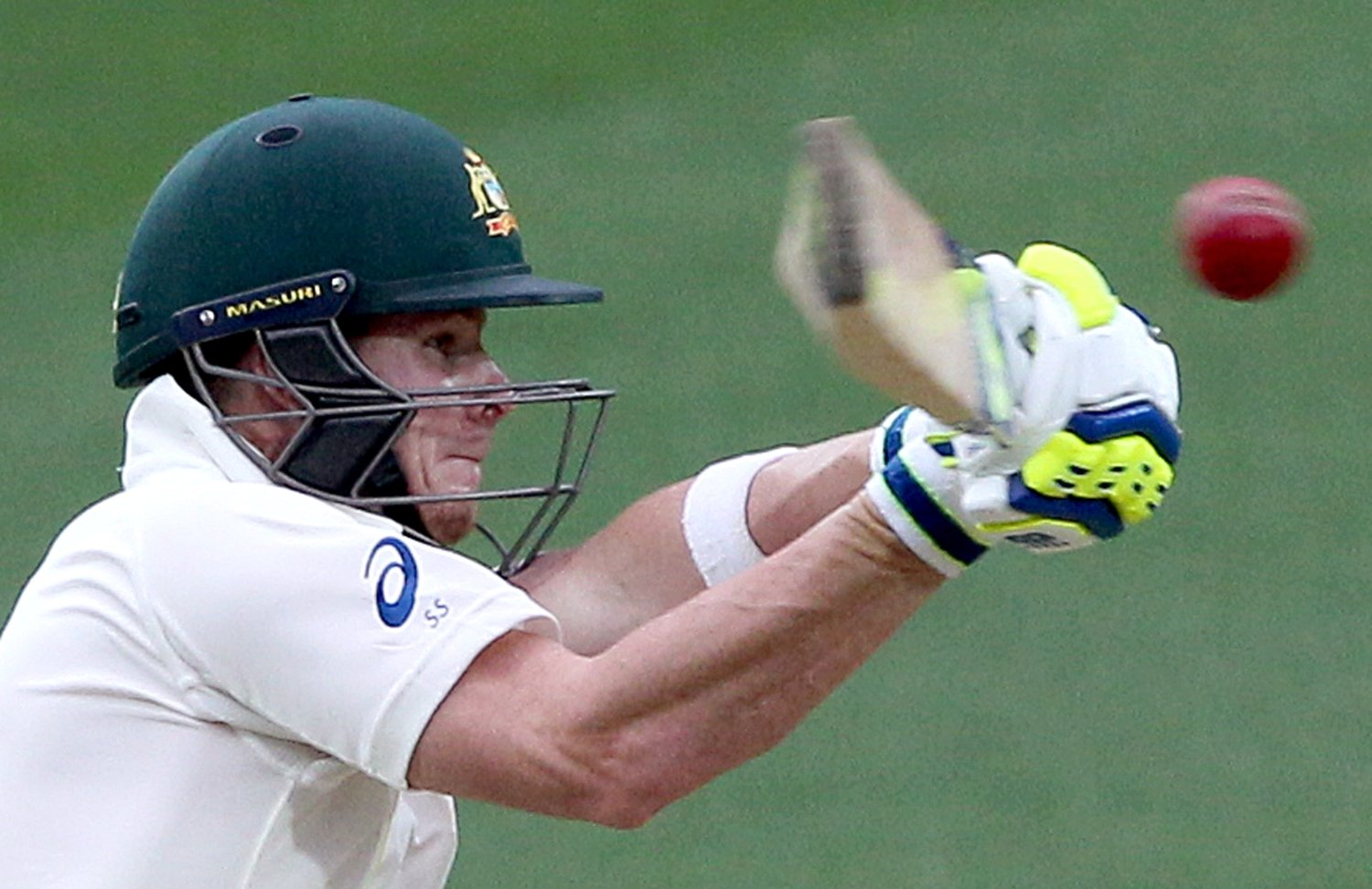 Australia's Steve Smith drives the ball during the second day of their cricket test match against India in Adelaide. Photo: AP