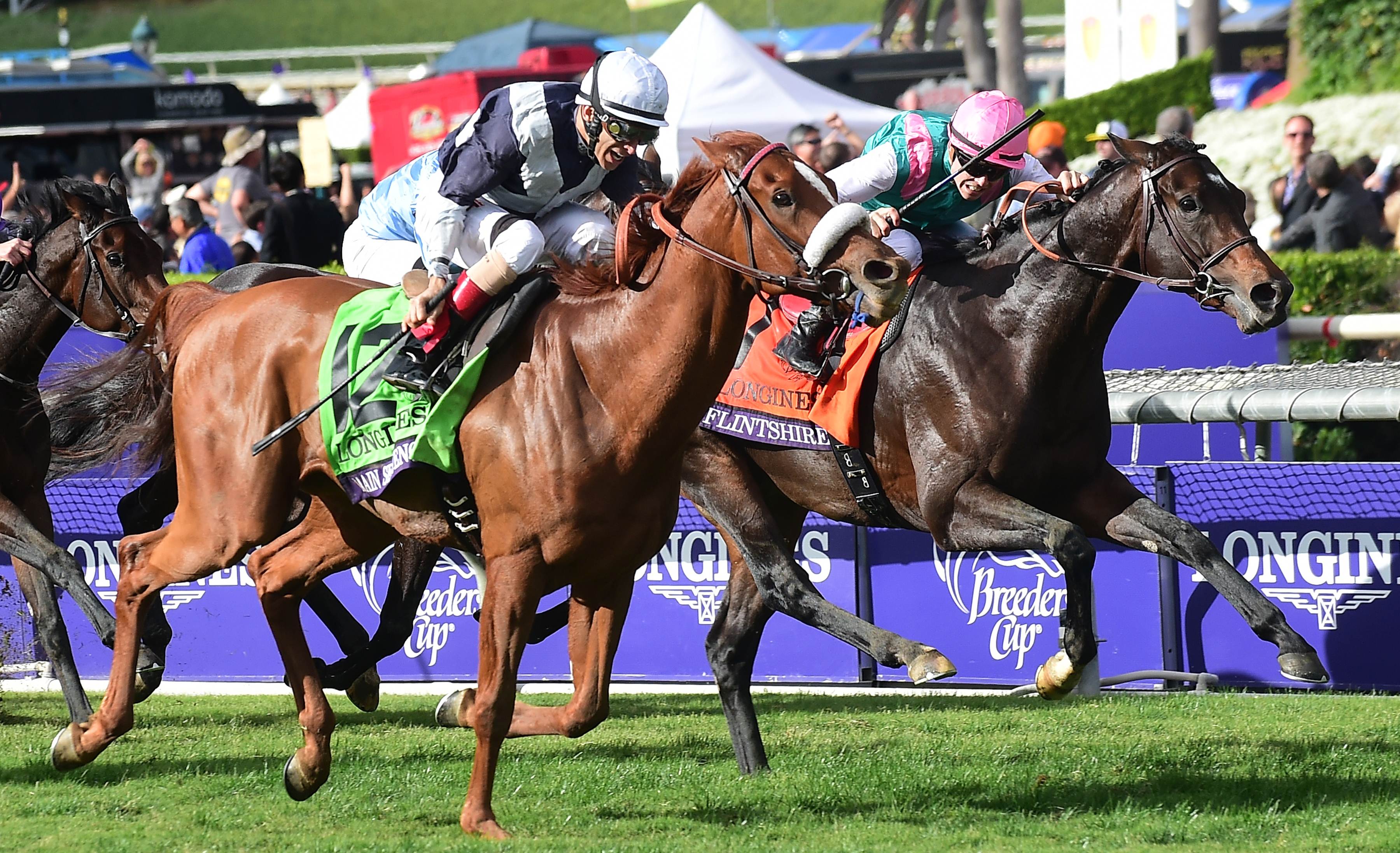Flintshire fights back on the inside but Main Sequence proves too strong in the Breeders' Cup Turf at Santa Anita. Photo: AFP